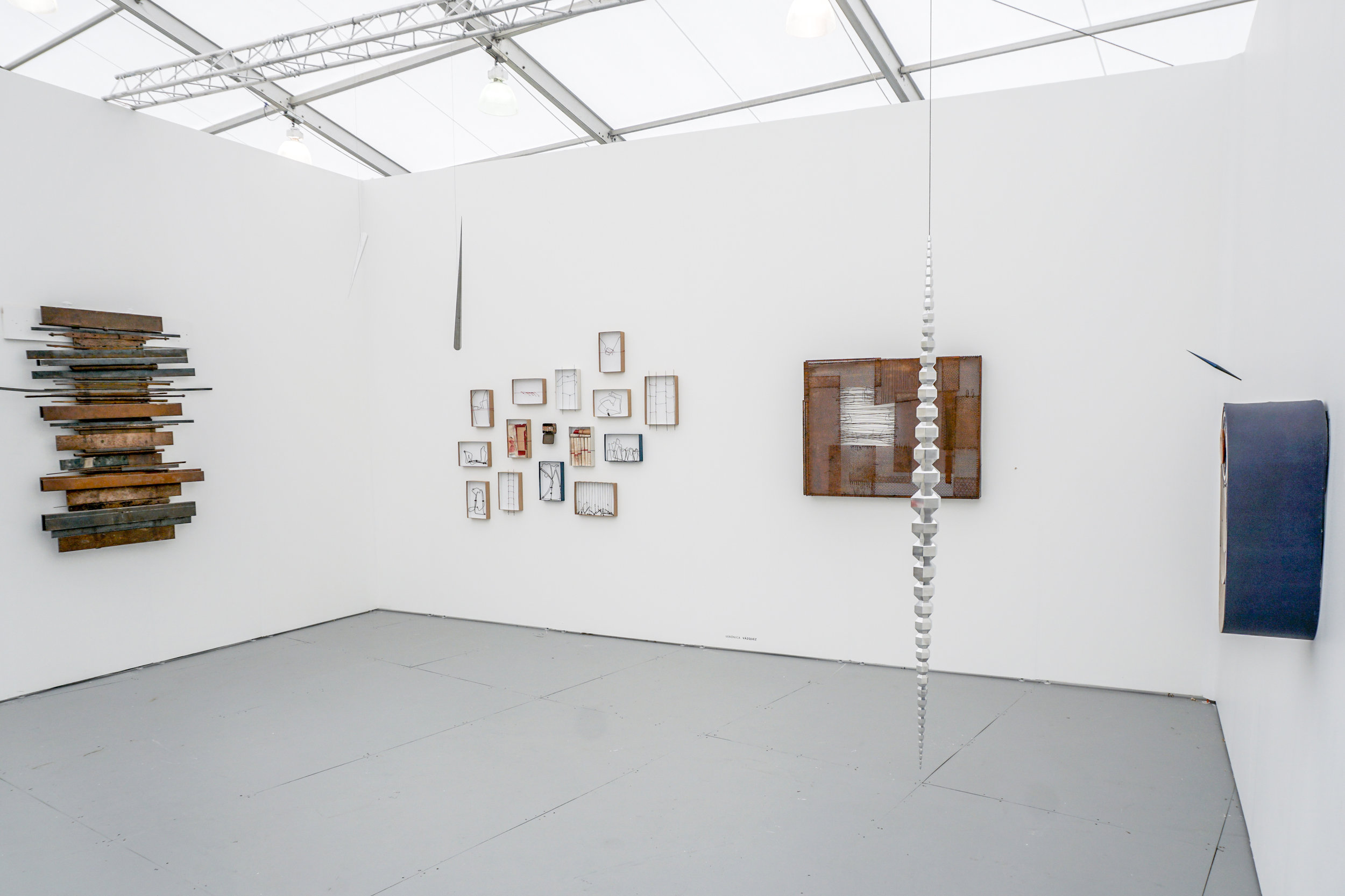 Works by Veronica Vazquez and Artur Lescher, installation view at Untitled Miami Fair. Photo courtesy of Piero Atchugarry Gallery.
