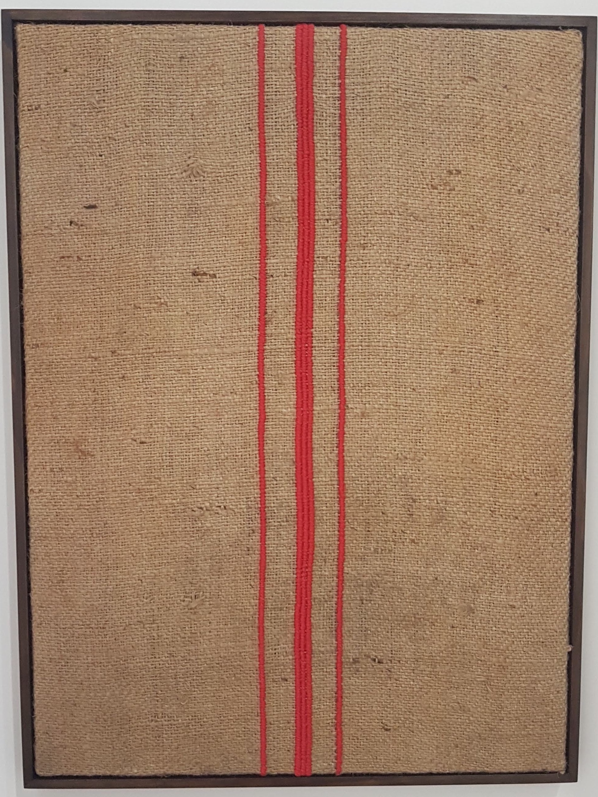 Alexandre da Cunha, Fair Trade XXIII, 2016, embroidery on burlap sack in collaboration with Luisa Strina, 30.7 x 22.8 x 1.6 inches. Photo credit to the writer.