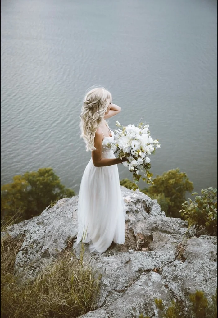 Shannon on Rocks.JPG