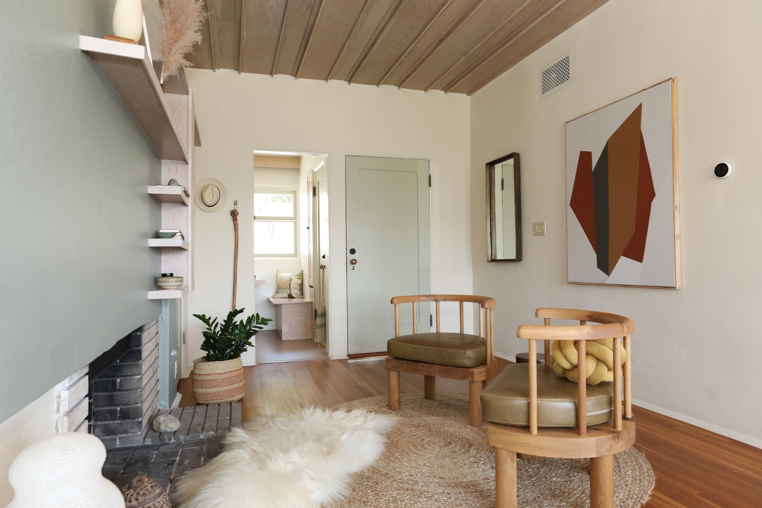 The front door and living room in the Maid's Room at Manola Court.