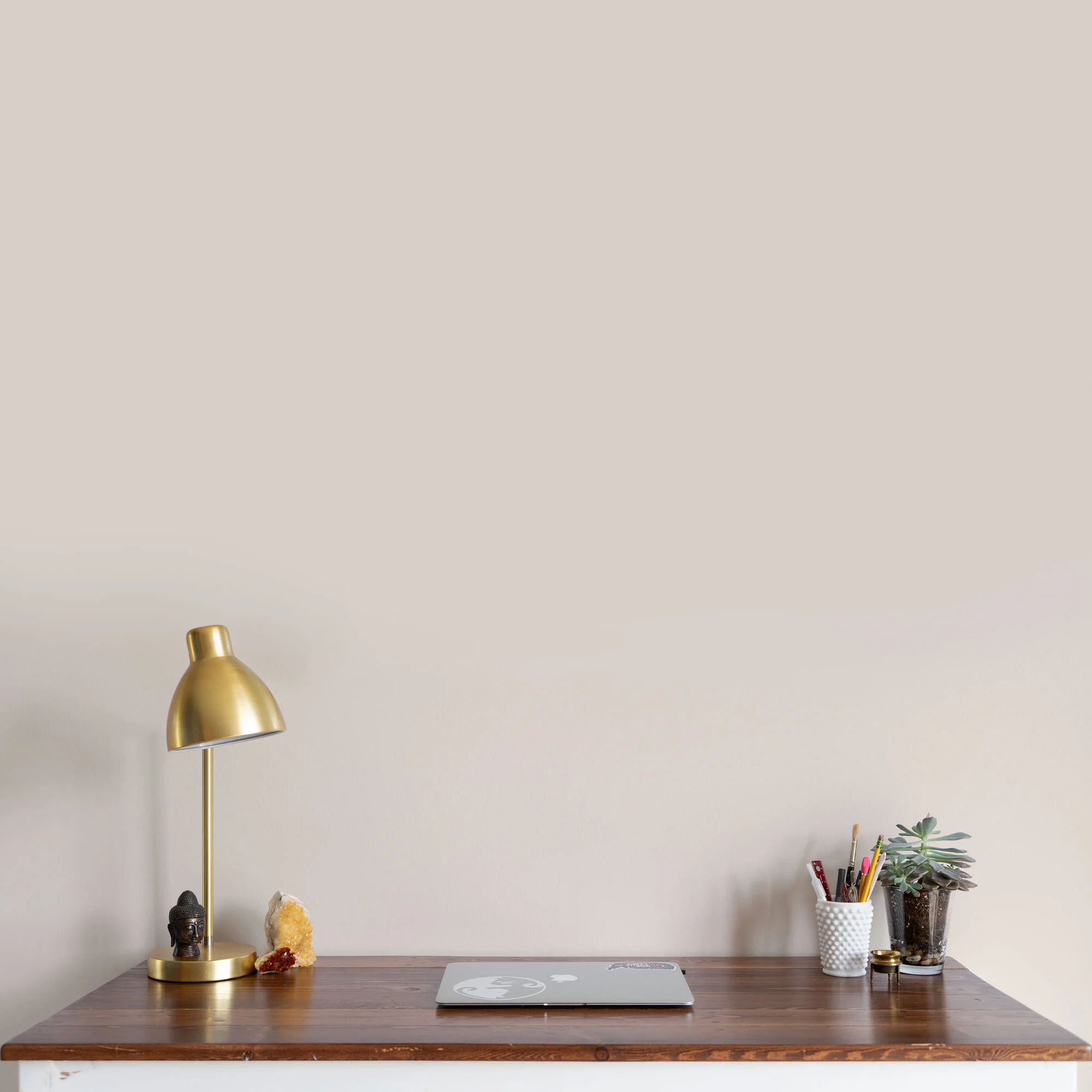 minimal-designer-desk-workspace-with-laptop-blank-wall.jpg