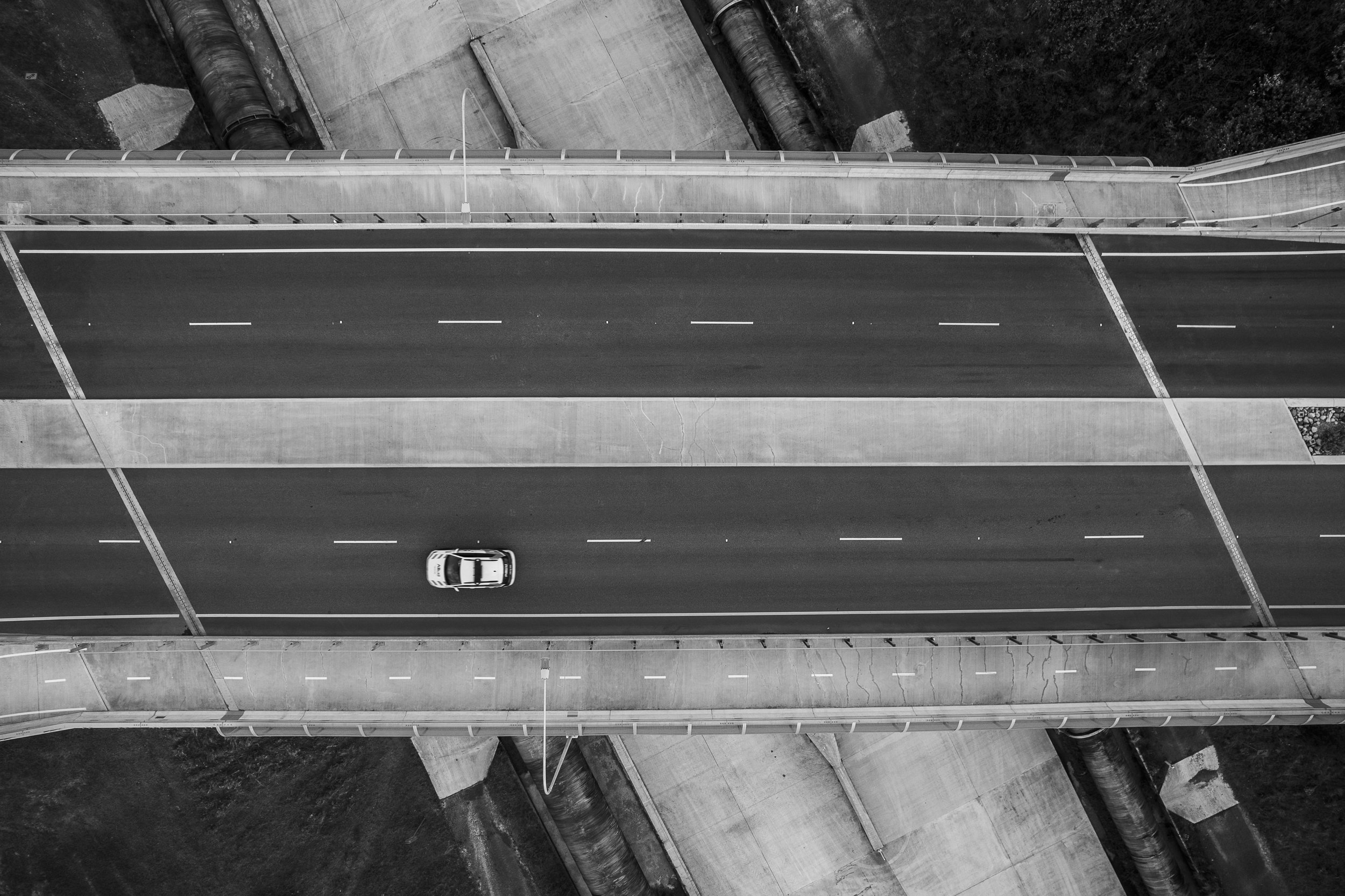 Aerial capture of bridge in Western Sydney warehouse district.