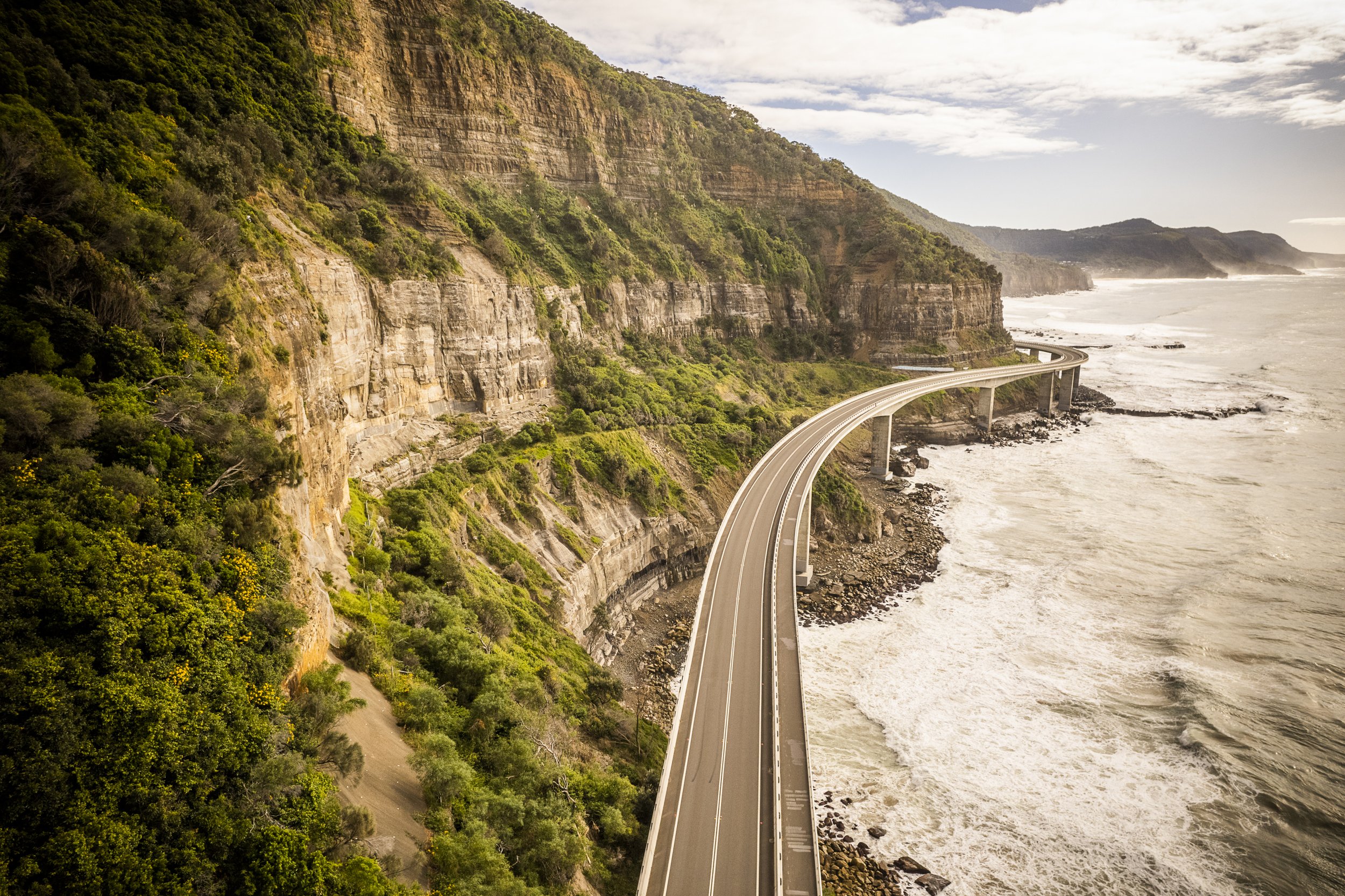 Landscape aerial capture of coastal bridge in Southern Sydney.