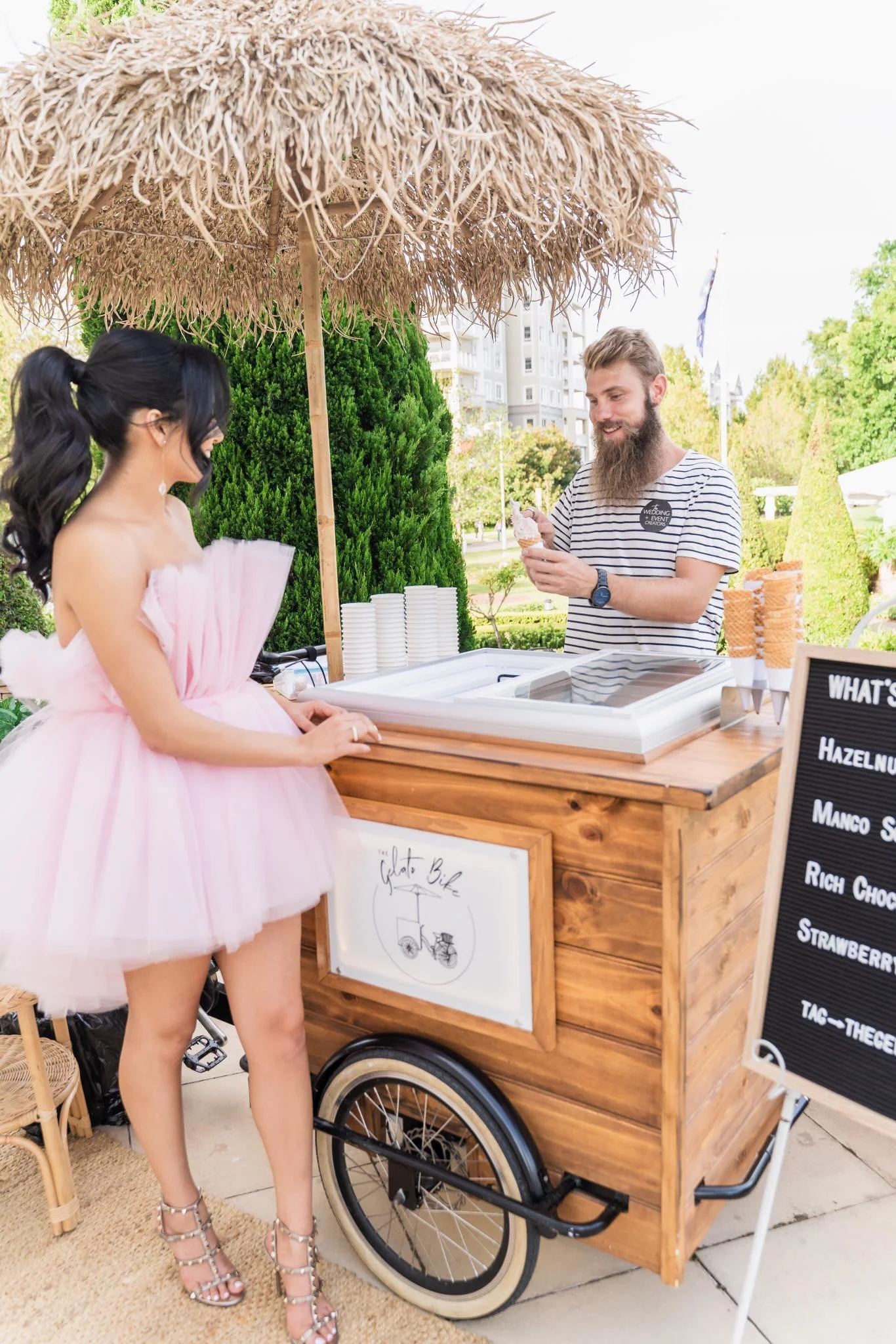 Guests enjoying gelato at a coastal wedding