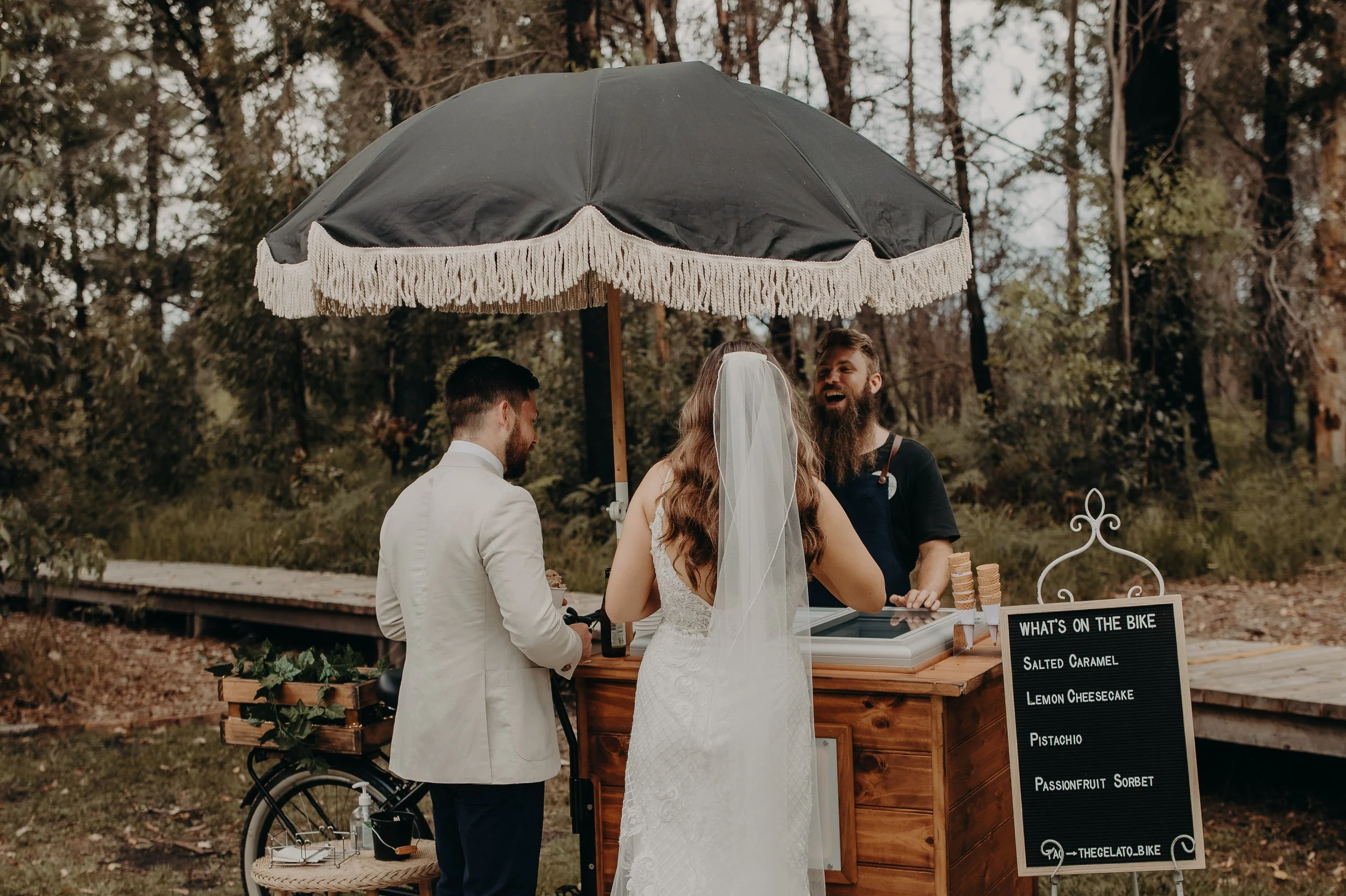 Couple enjoying gelato after their wedding ceremony at Bawley Vale Estate