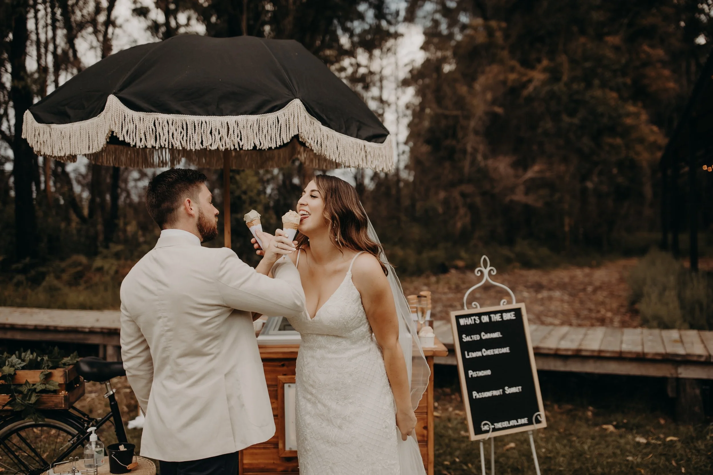 Couple enjoying gelato after their wedding ceremony at Bawley Vale Estate