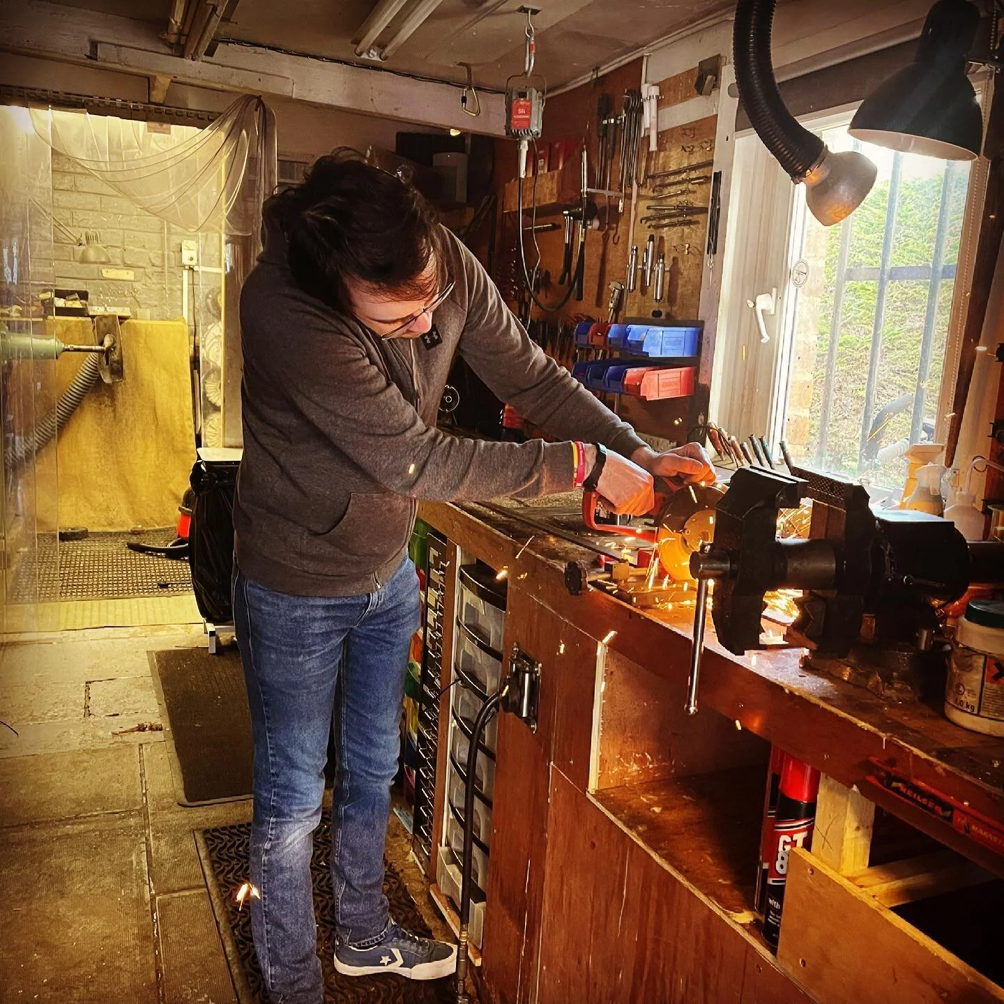 Euan in the machine shop making up new shelving brackets fro the Saxophone  room at Edinburgh music centre