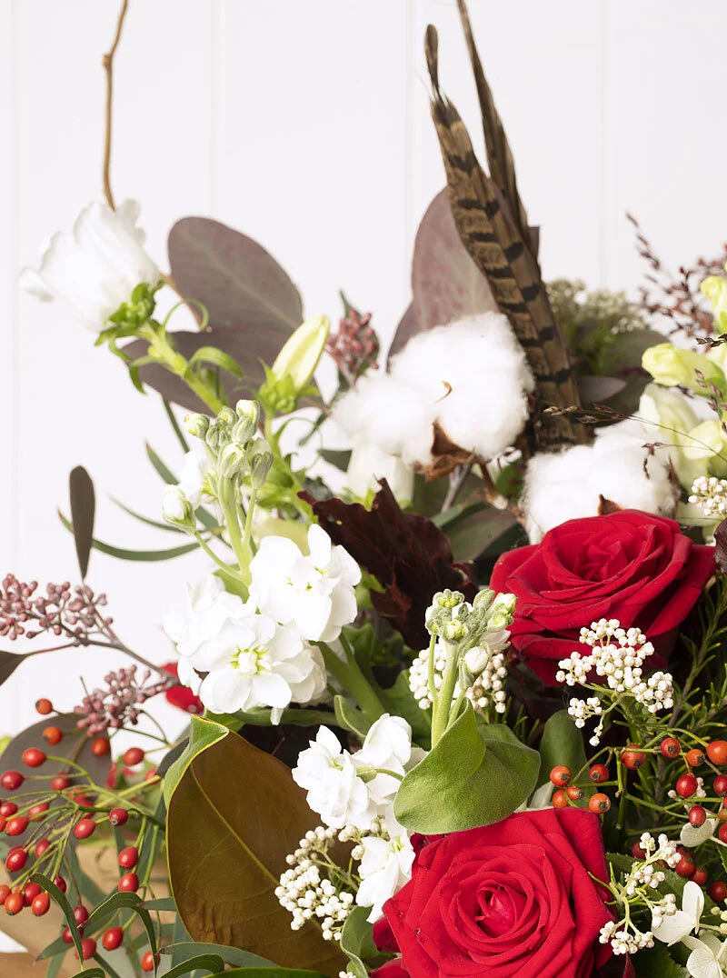 Festive Christmas floral arrangements by Arcade Flowers