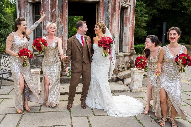 Rich red blooms, shimmering champagne gowns... and a peacock! Looks very much like a summer wedding to us! 
Photography by Dan Bold Photo
Venue @larmertree
⠀⠀⠀⠀⠀⠀⠀⠀⠀
bridesmaids bouquets, artisan wedding florist, bridal inspiration