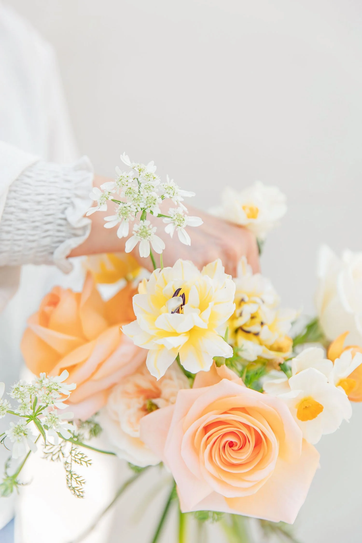 Emma Newson-Smith creating natural floral arrangements for weddings and events