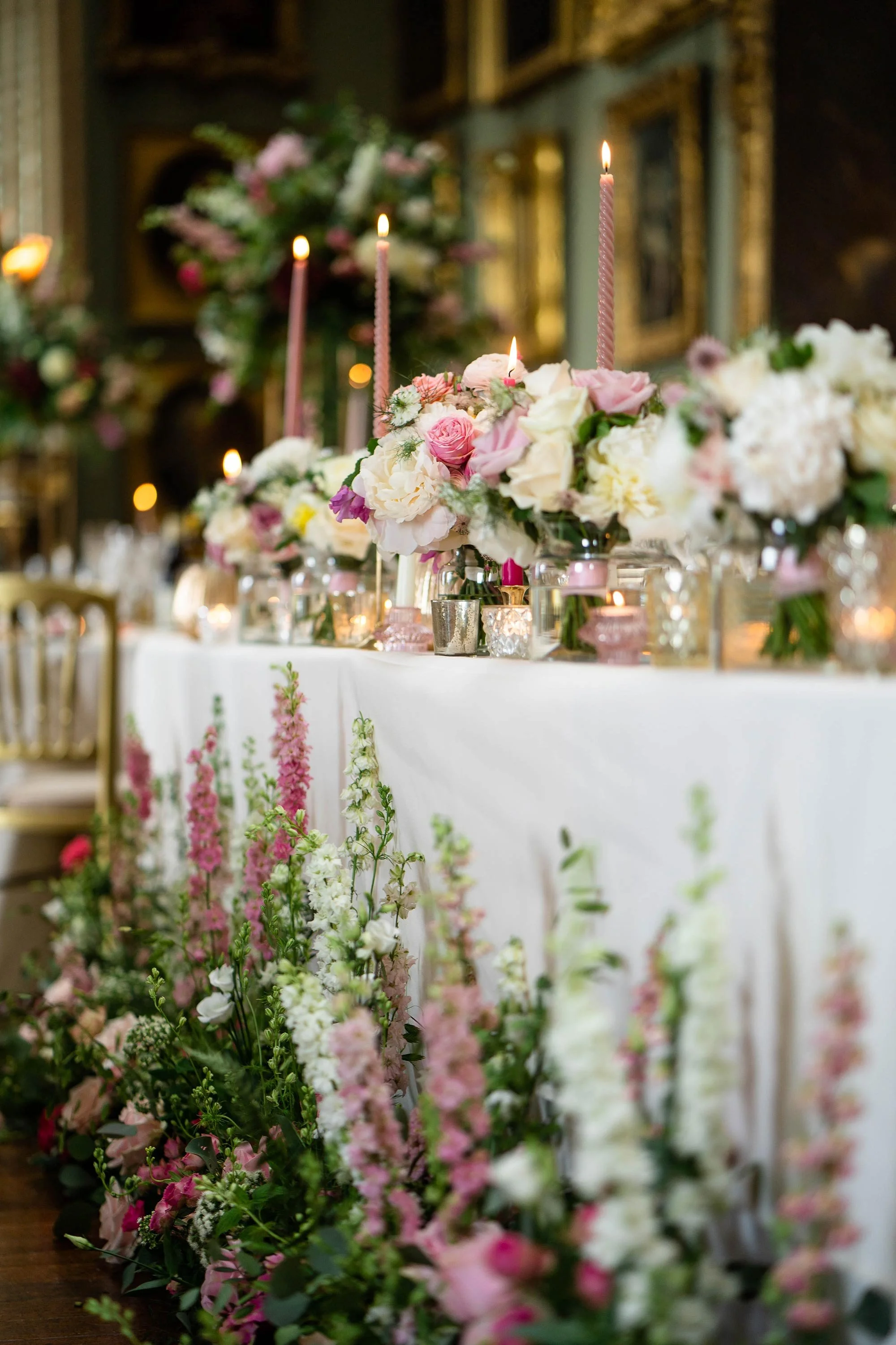 colourful wedding reception table and floor arrangements