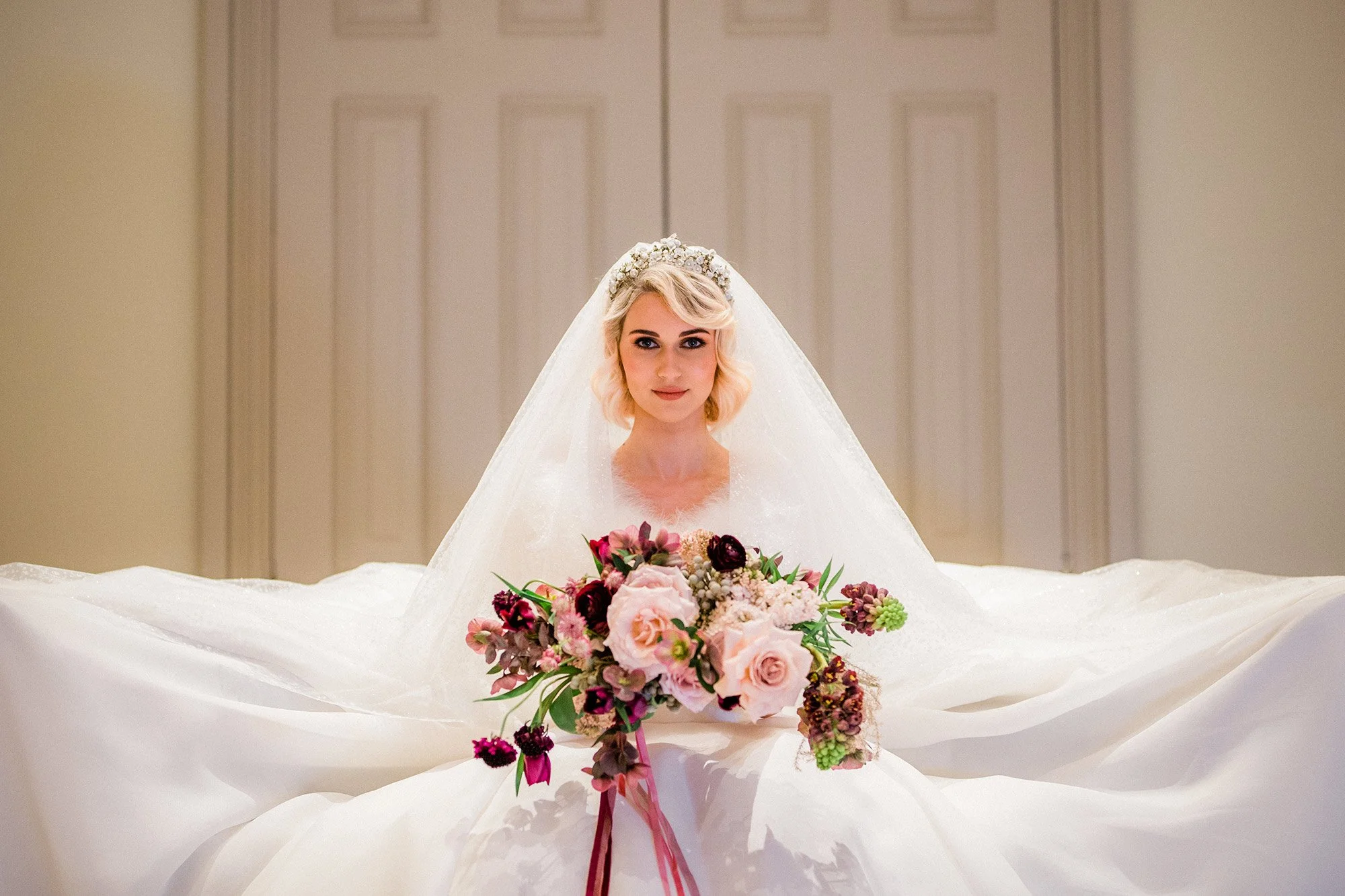 winter bridal bouquet in pinks and reds