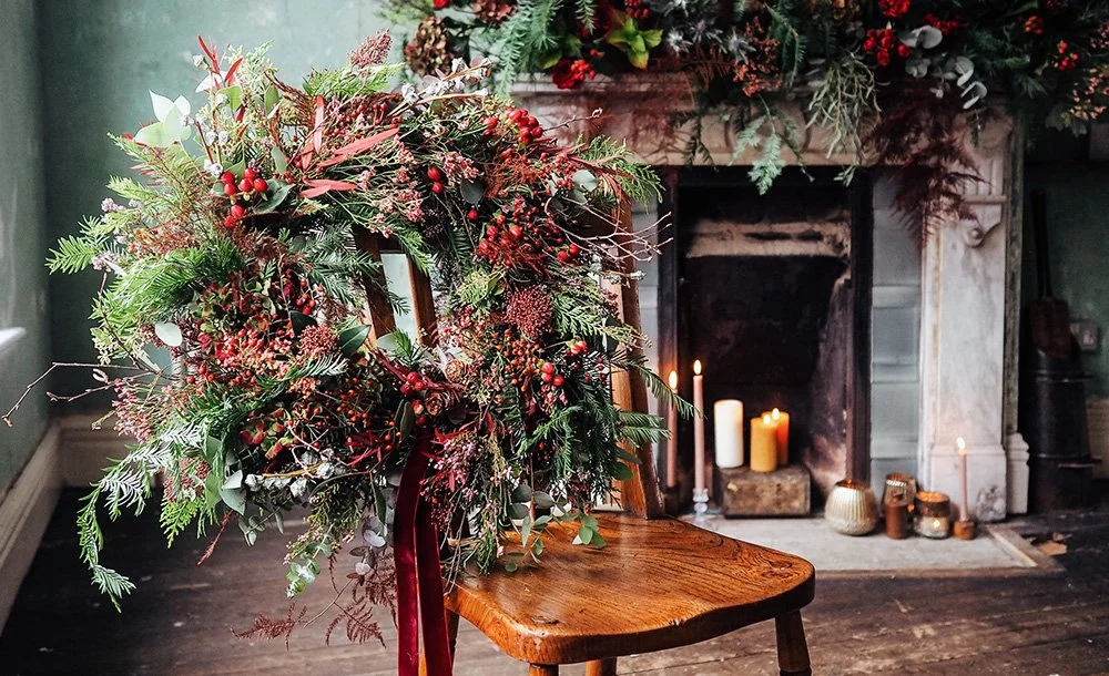 Luxury Christmas styling with festive wreaths, winter foliage and elegant seasonal décor in a country home
