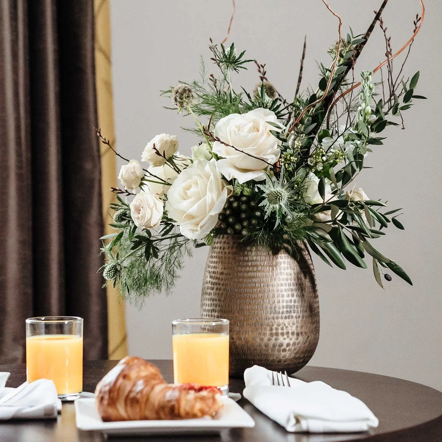 Lifestyle hotel shoot featuring fresh flowers and relaxed luxury interiors