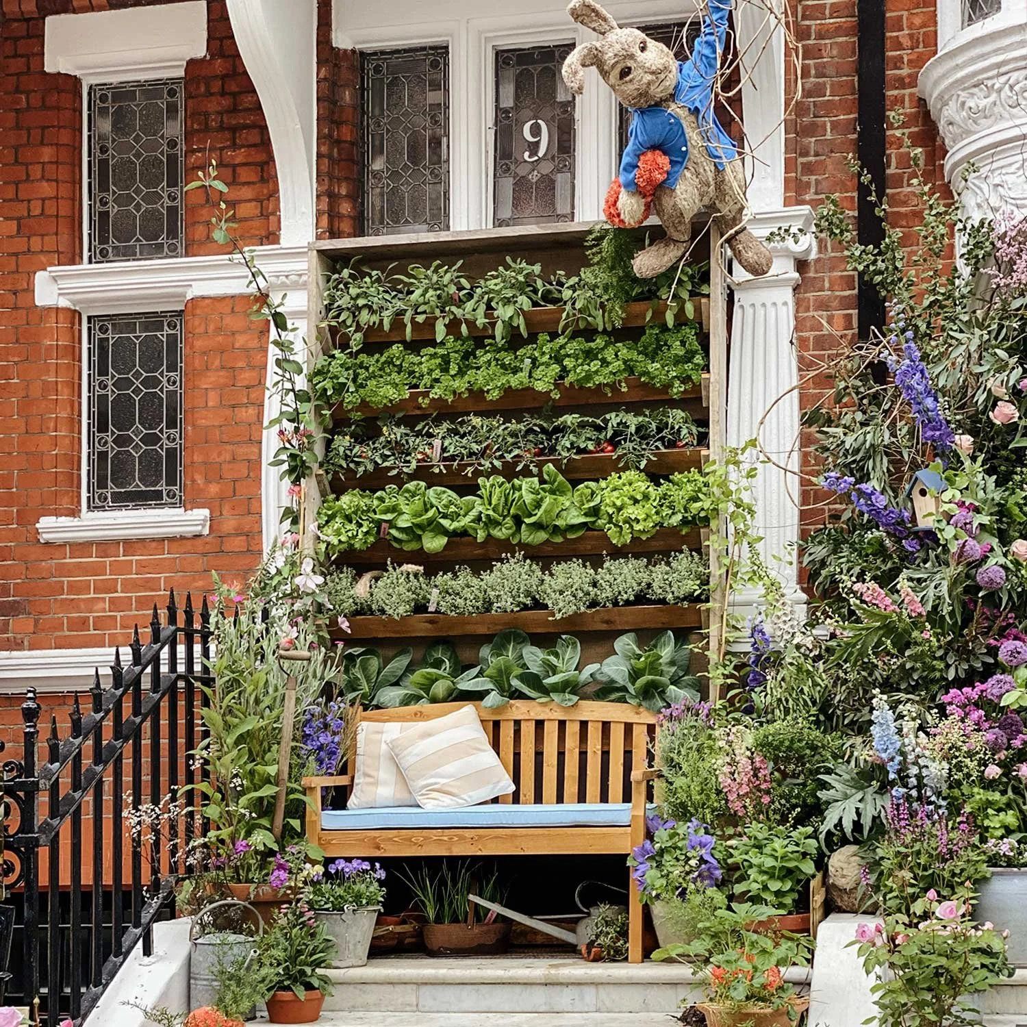Vertical vegetable garden floral installation inspired by Mr McGregor’s garden