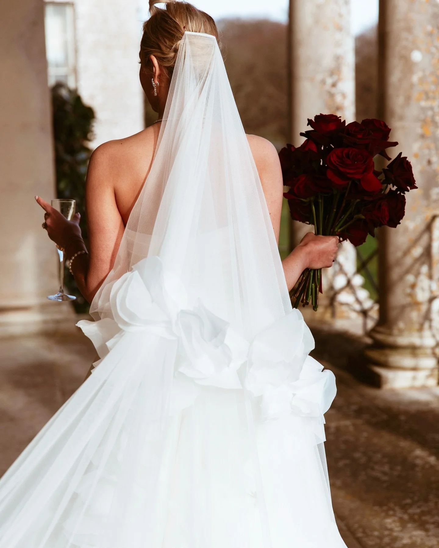 As Valentine&rsquo;s Day approaches, we can&rsquo;t help but reminisce on the romance in rich red hues of @annajpvizard &lsquo;s beautiful wedding 🌹 &hearts;️ 
Wedding Dress - Custom Tucker Gown @annebarge @annebargebridalatelier @theweddingcluboffi