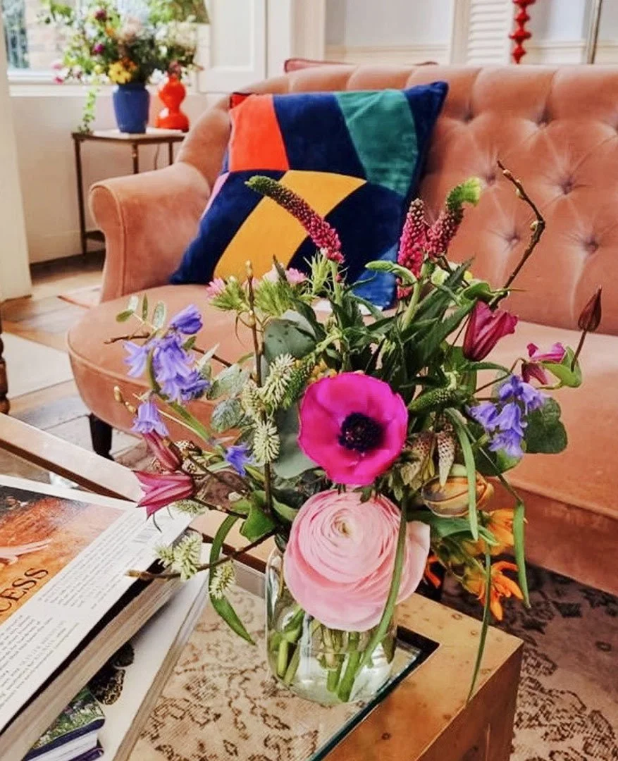 Lifestyle hotel shoot featuring fresh flowers and relaxed luxury interiors