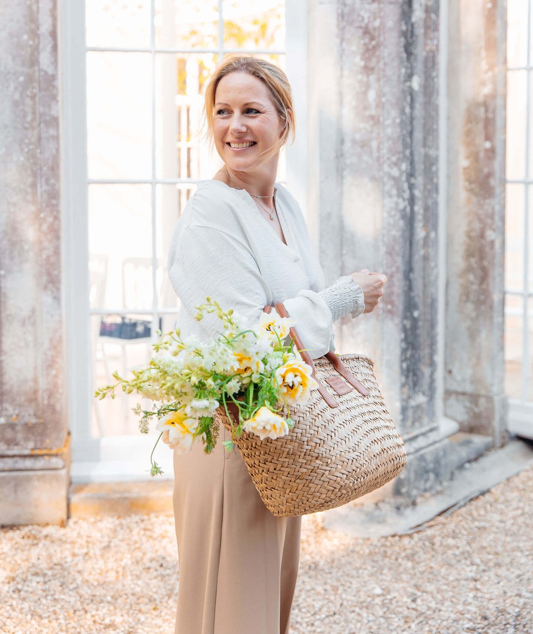 Emma Newson-Smith creating natural floral arrangements for weddings and events