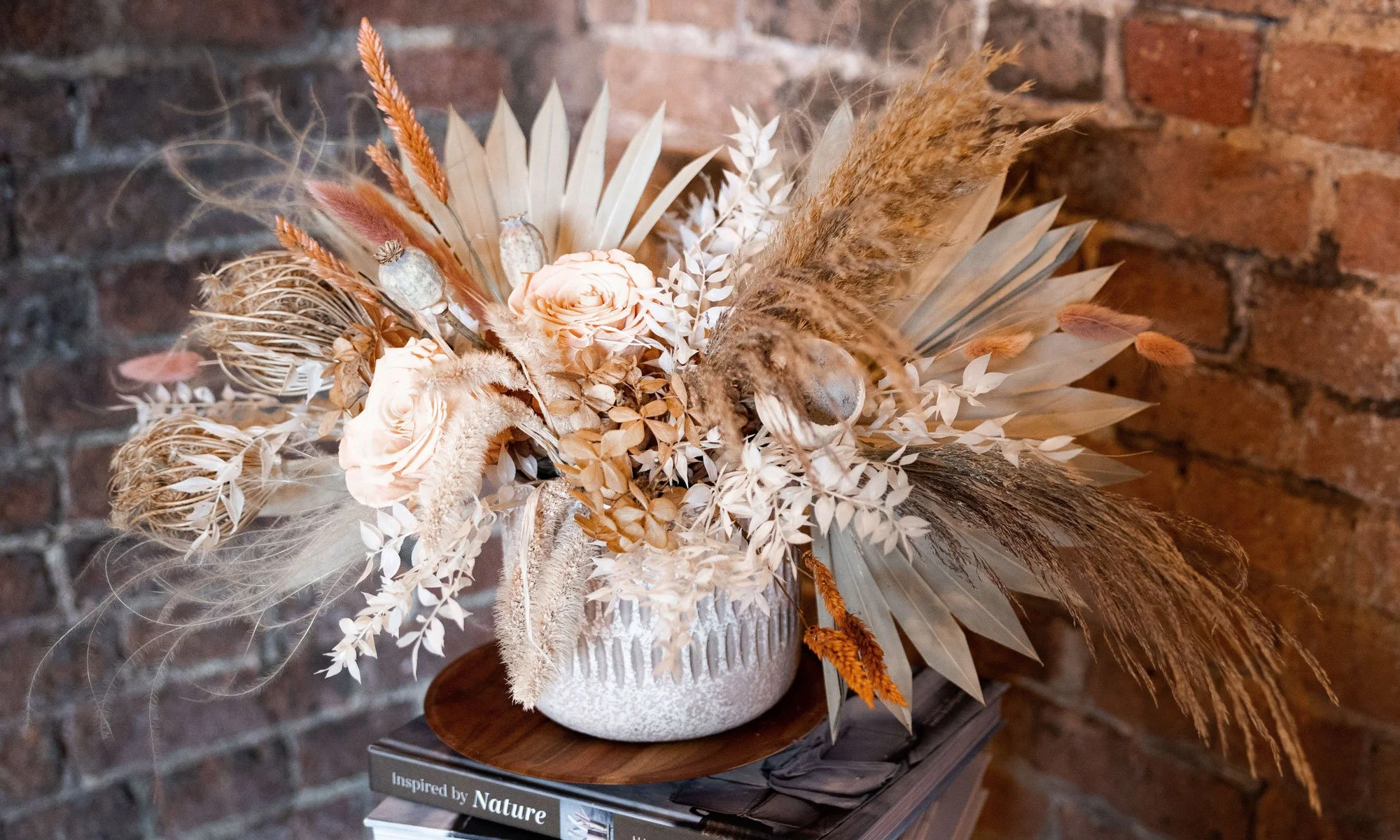 Collection of artisan dried flower arrangements by Arcade Flowers