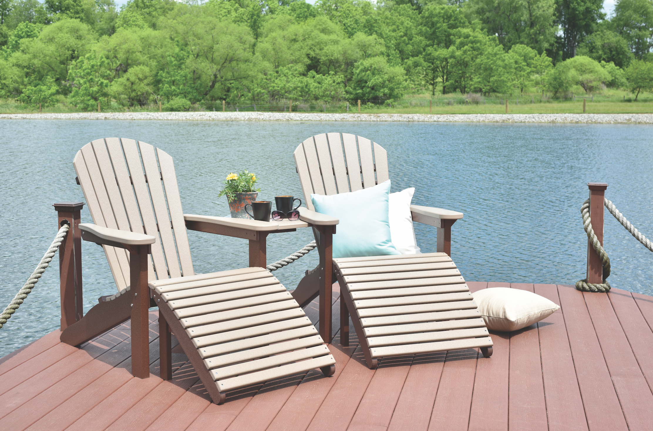  Two Adriondack lounge chairs lakeside 