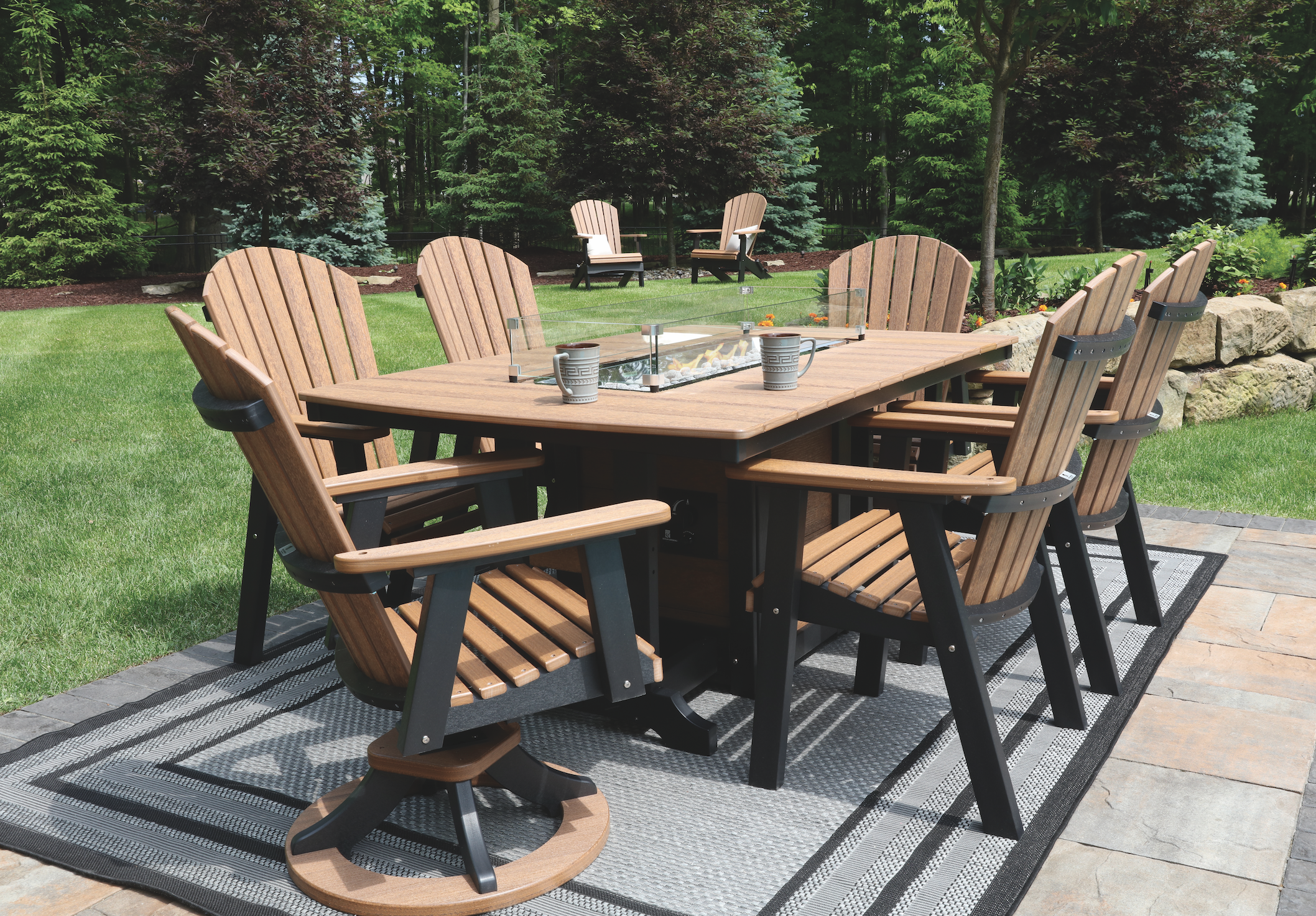  Garden classic 44” x 72” rectangular fire table (dining height), comfo dining chairs, comfo swivel rocker dining chairs in antique mahogany on black. 