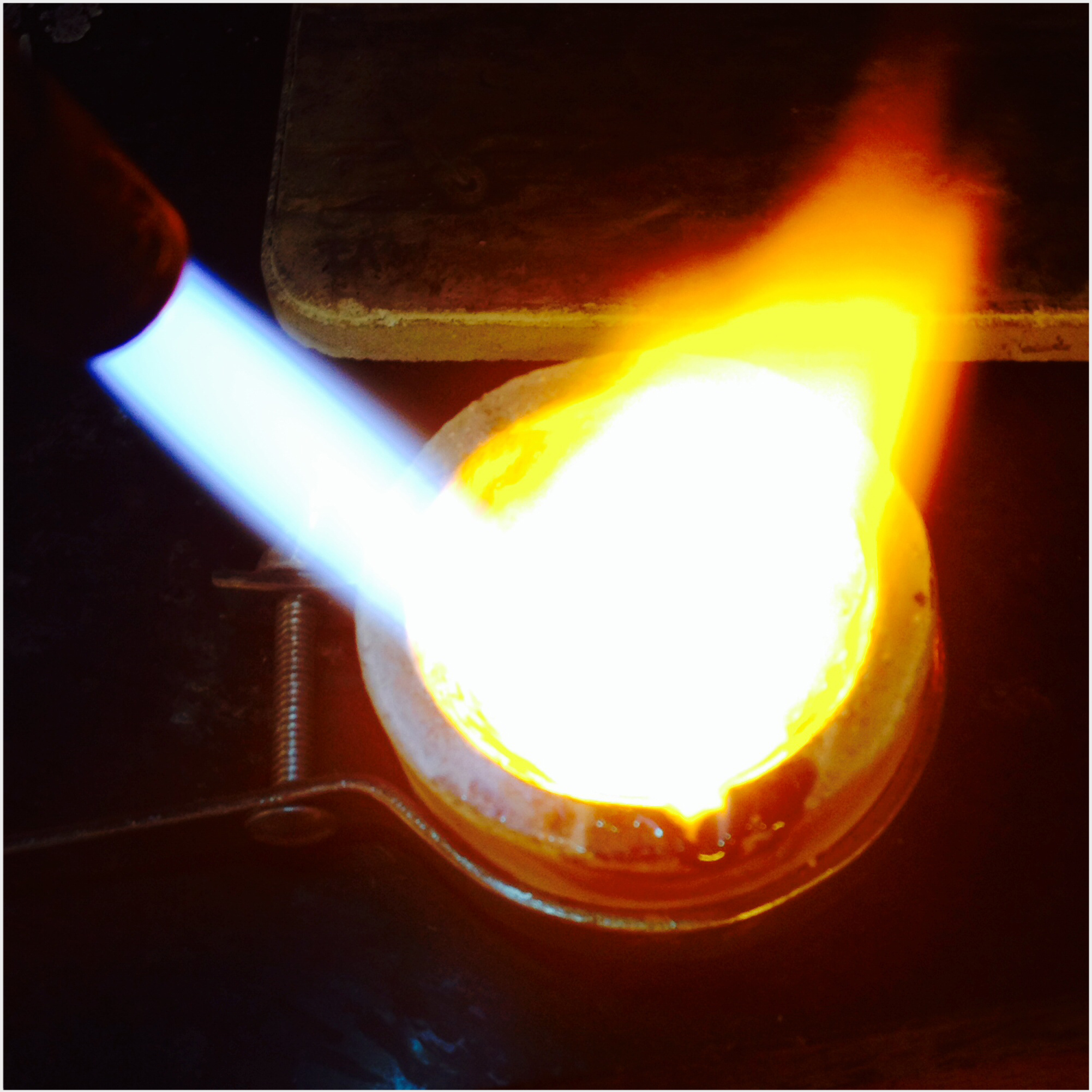 melting metal in the crucible