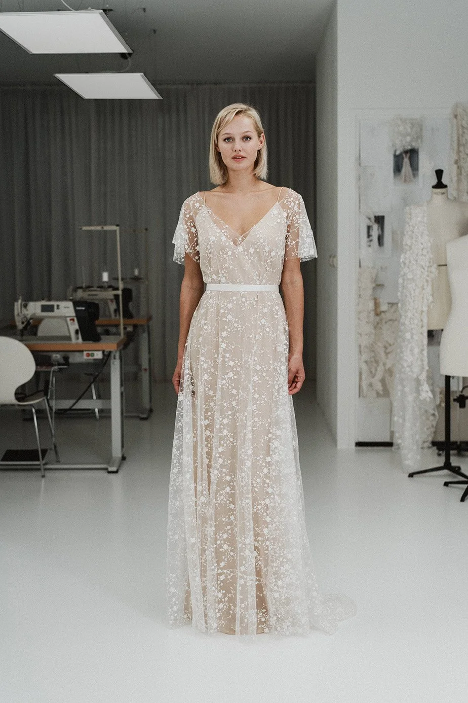 Model wearing the "Lily" tulle and crepe wedding dress from Atelier Edwin Oudshoorn