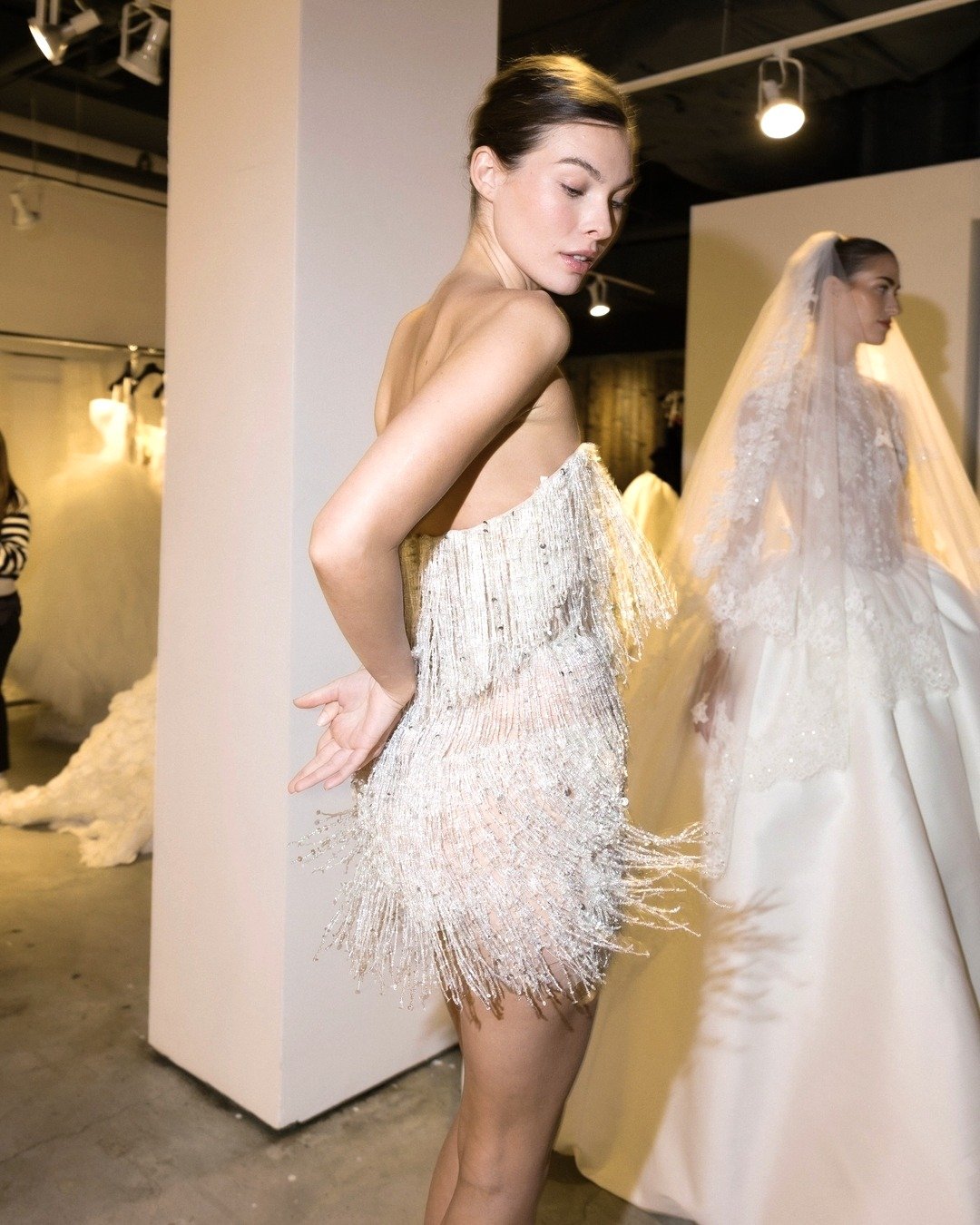 The Perfect Bridal Mini?!

Thousands of hand embroidered sequins and beads on a tulle corset. With us until end of July.