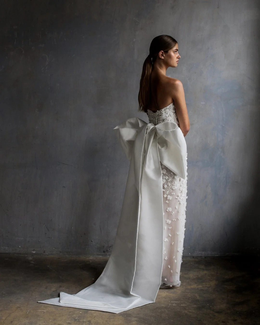 We love a giant bow....
Here our 'Paris' version in a lightweight Silk Blend Mikado fabric with trailing ribbons.

Combined with out 'Catherine' fully embroidered column wedding gown crafted in Silk and Italian tulle.

📷 @Irisdorine