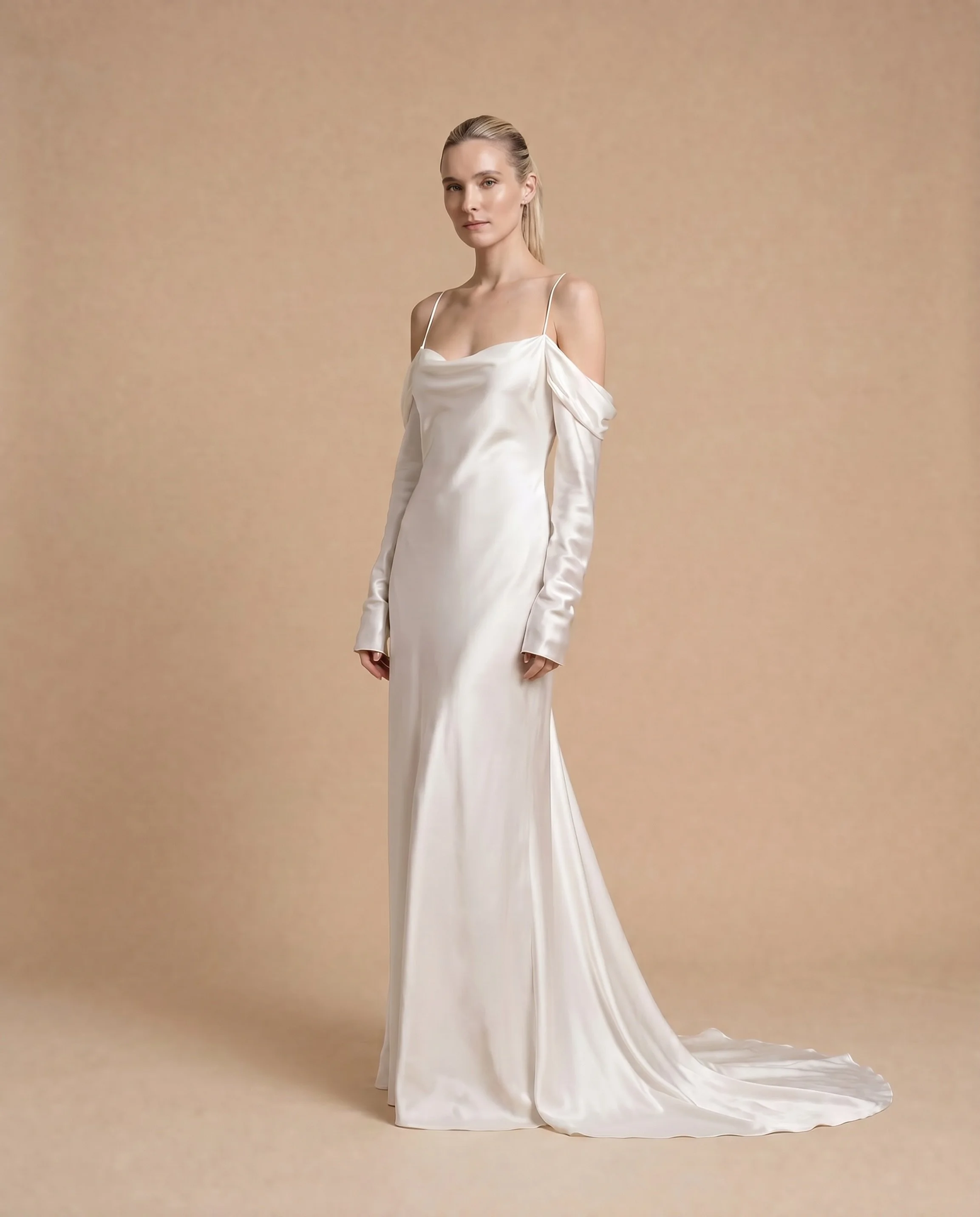 Pure silk satin. Inside and out. 

&lsquo;Clara&rsquo; A bias cut slip dress with a draped neckline, optional/removable sleeves and a deep plunging back.