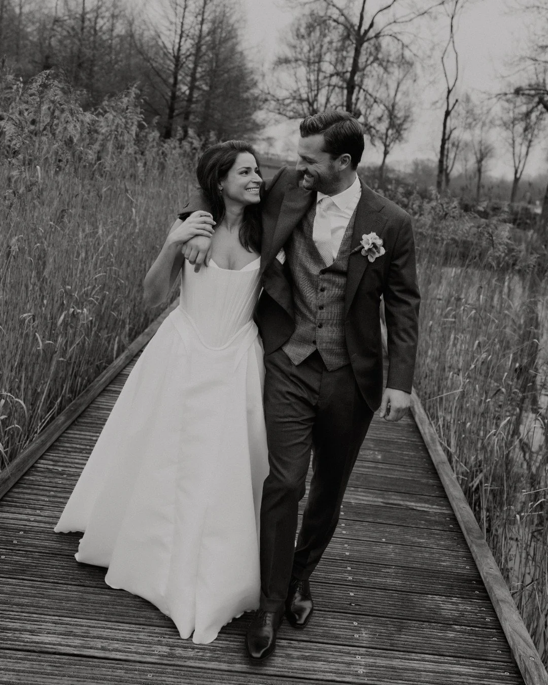 These two got married a little while ago but the pictures are just in and we can't stop smiling from all the love!!

She wore a custom gown combination crafted in a featherlight Mikado.

Congratulations G +D!!!