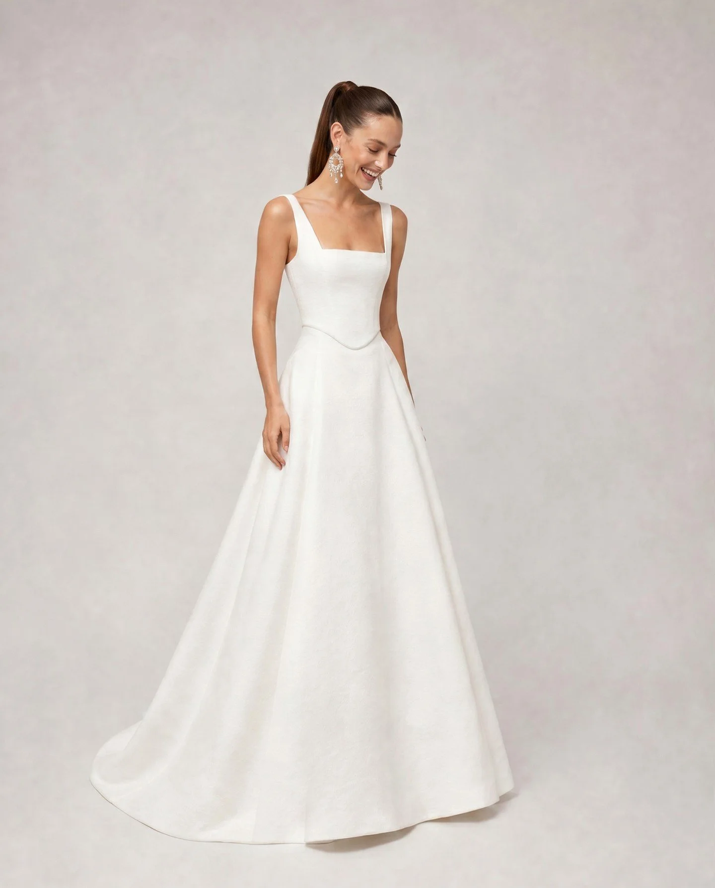 New on our rails and custom made in Spain for our boutique is this beautiful two-piece look from Jesus Peiro.

Crafted in a beautiful linen gauze, this dress features a corset bodice with basque and puff sleeves. This is combined with a separate a-li