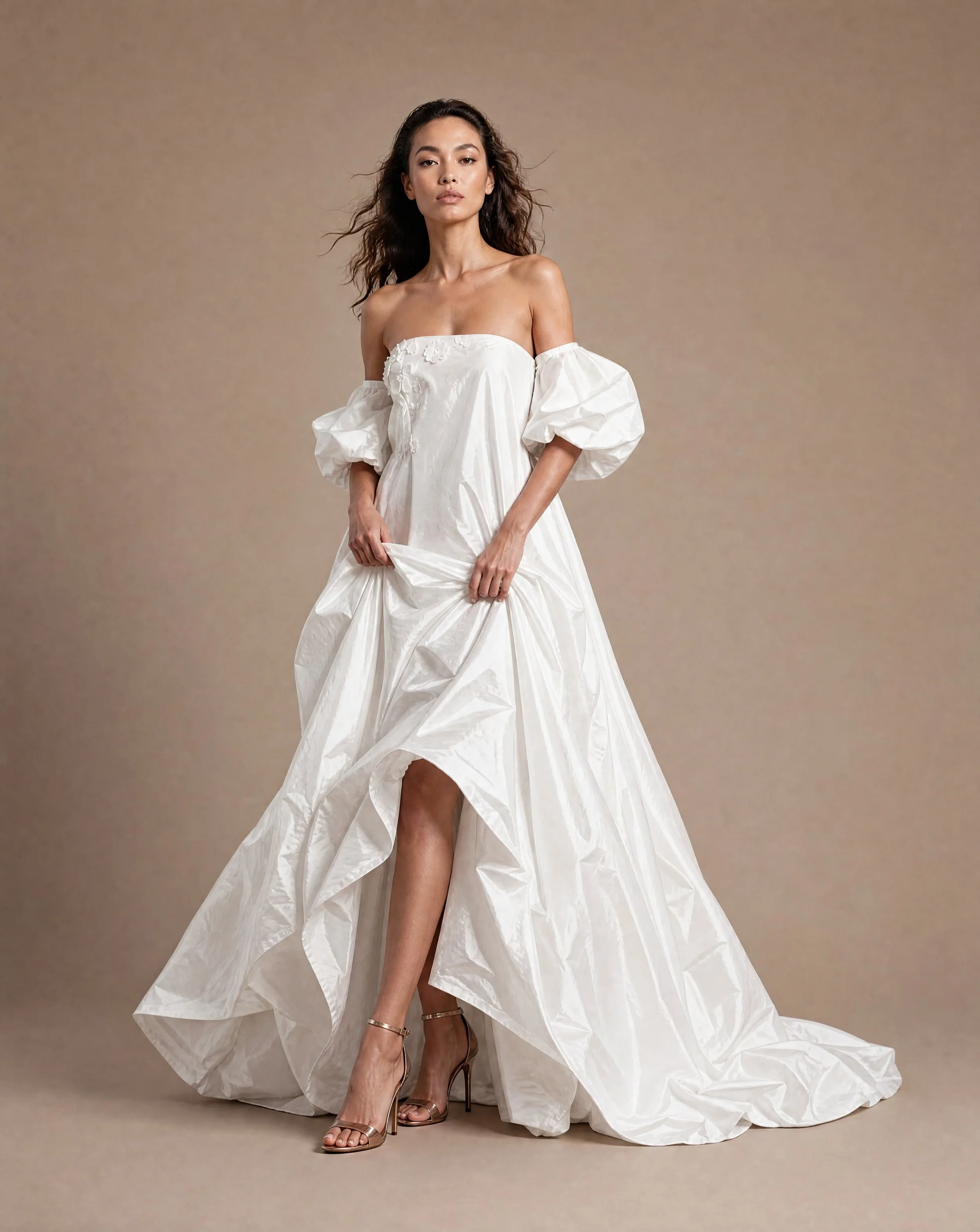 Billowing silk taffeta with removable balloon sleeves and internal corset. 

&lsquo;Scarlett&rsquo; is a dramatic silk wedding dress with modern silhouette from our atelier collection.