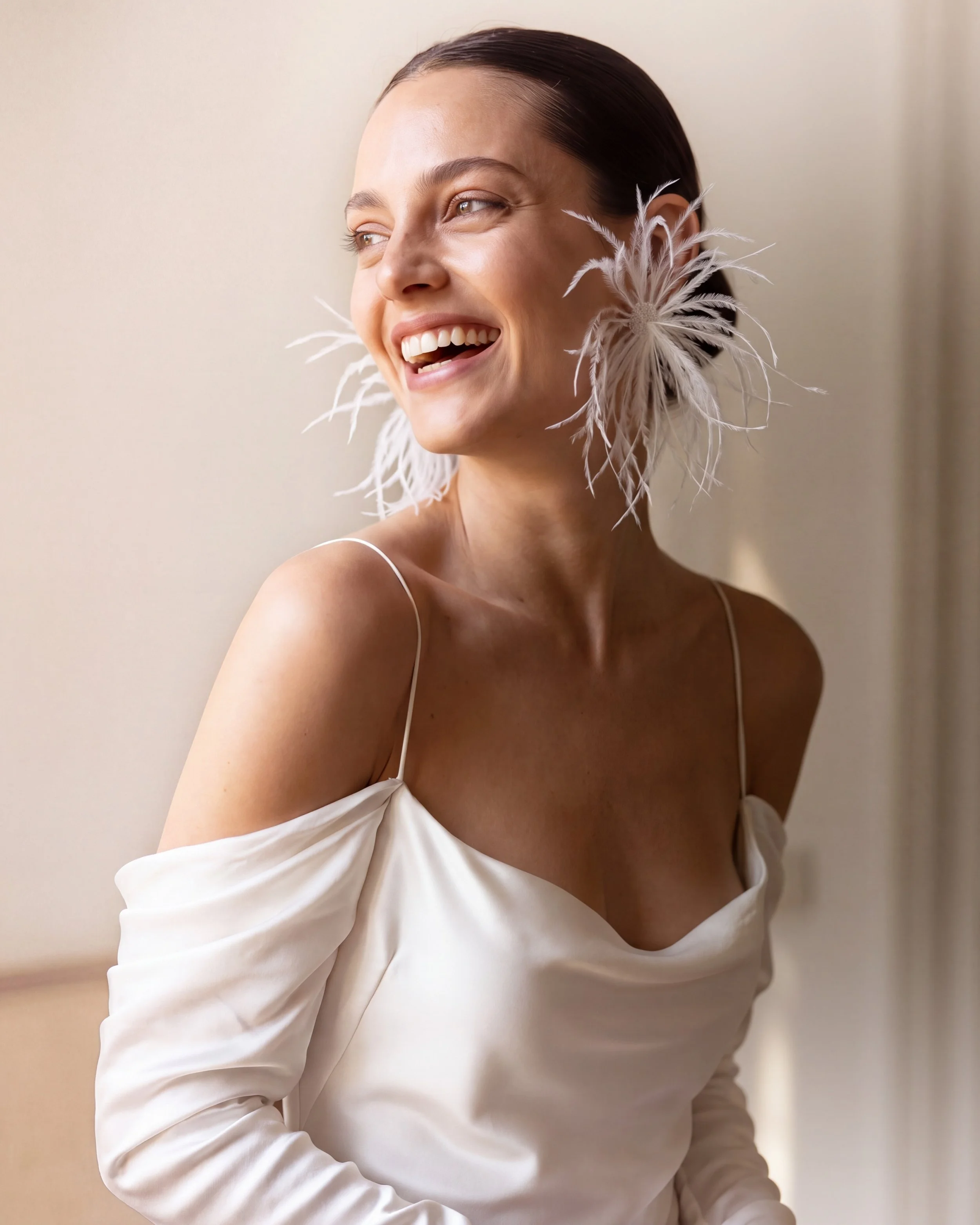 Feathers really are the perfect accessory.
Created for a special bride in out atelier, there feather earrings are perfect for dancing the night away!