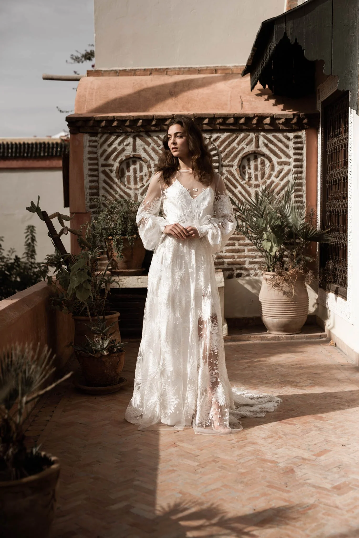 Bride wearing an ivory slip dress, with an embroidered tulle overdress with ribbon embroidery "Mara" by Atelier Edwin Oudshoorn