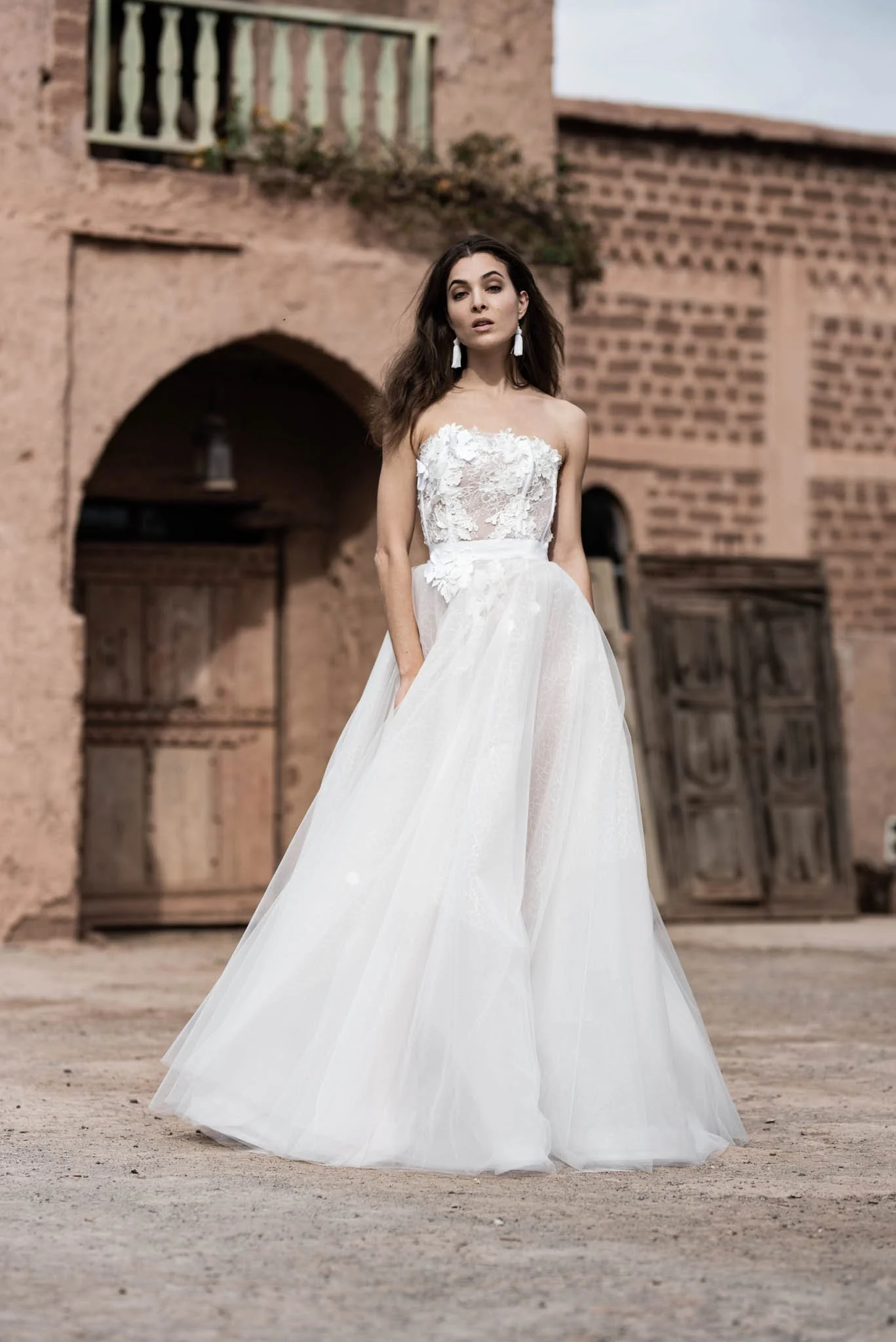 Bride wearing an Edwin Oudshoorn lace and tulle wedding ballgown "Anne"