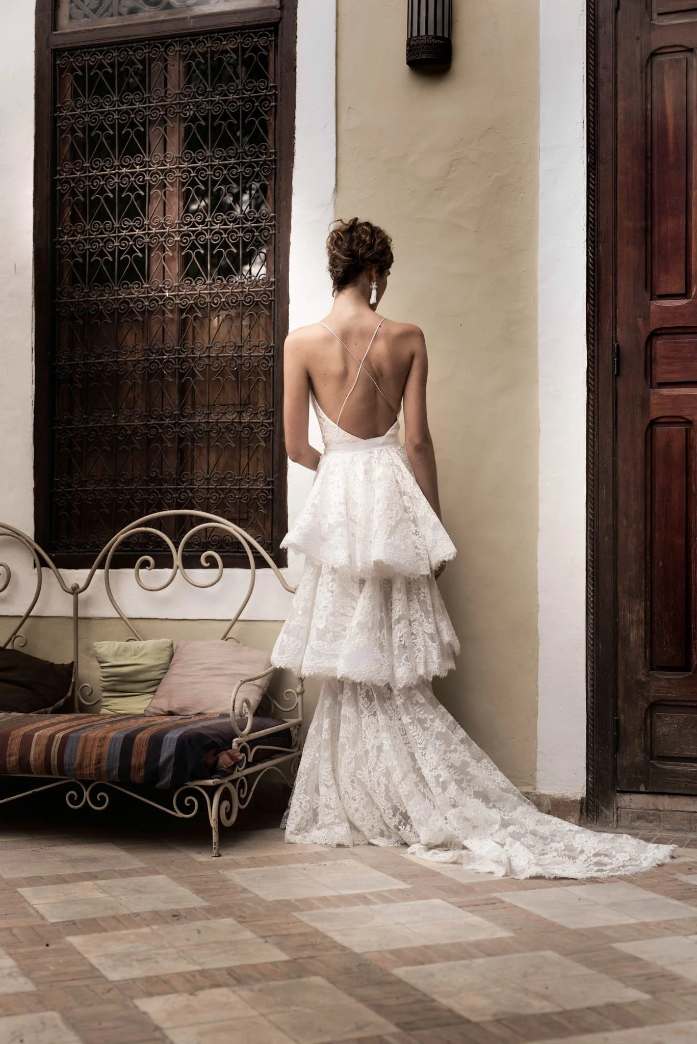 Bride wears wedding dress with layers of french lace "Kate" by Atelier Edwin Oudshoorn