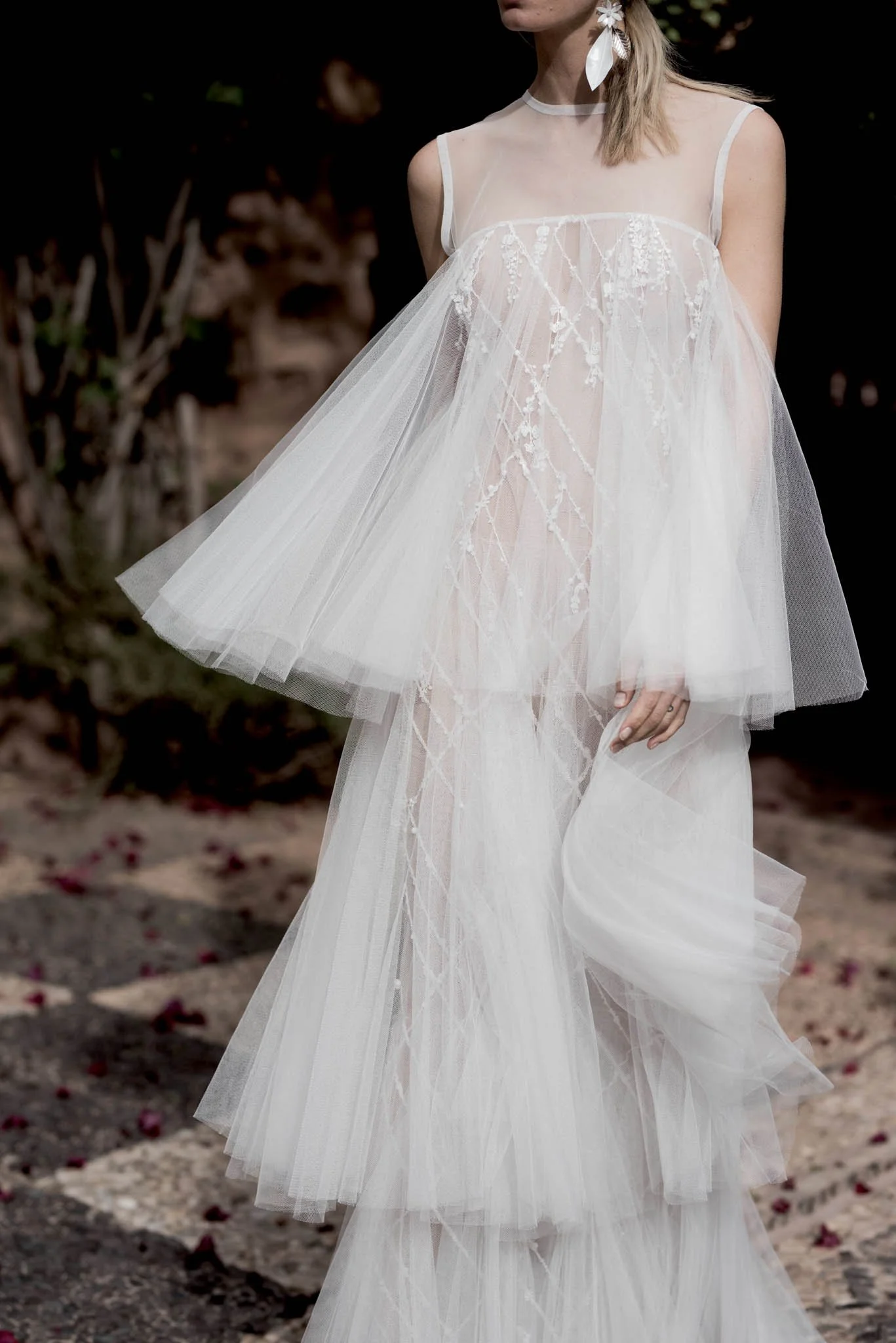 Bride wearing dramatic layered tulle wedding dress with beading and lace "Faye"  by Atelier Edwin Oudshoorn