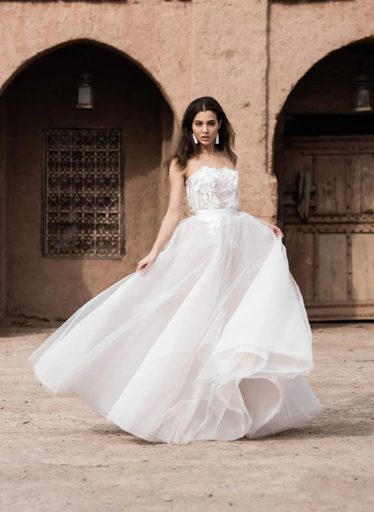 Bride wearing an Edwin Oudshoorn lace and tulle wedding ballgown "Anne"