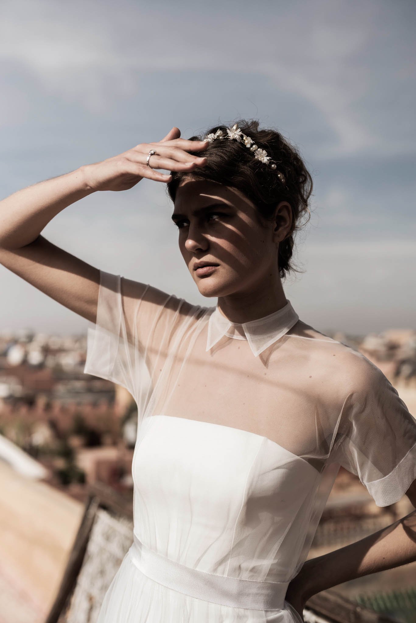 Bride wears a crepe column dress with a tulle overdress with short sleeves "Kirby" by Atelier Edwin Oudshoorn