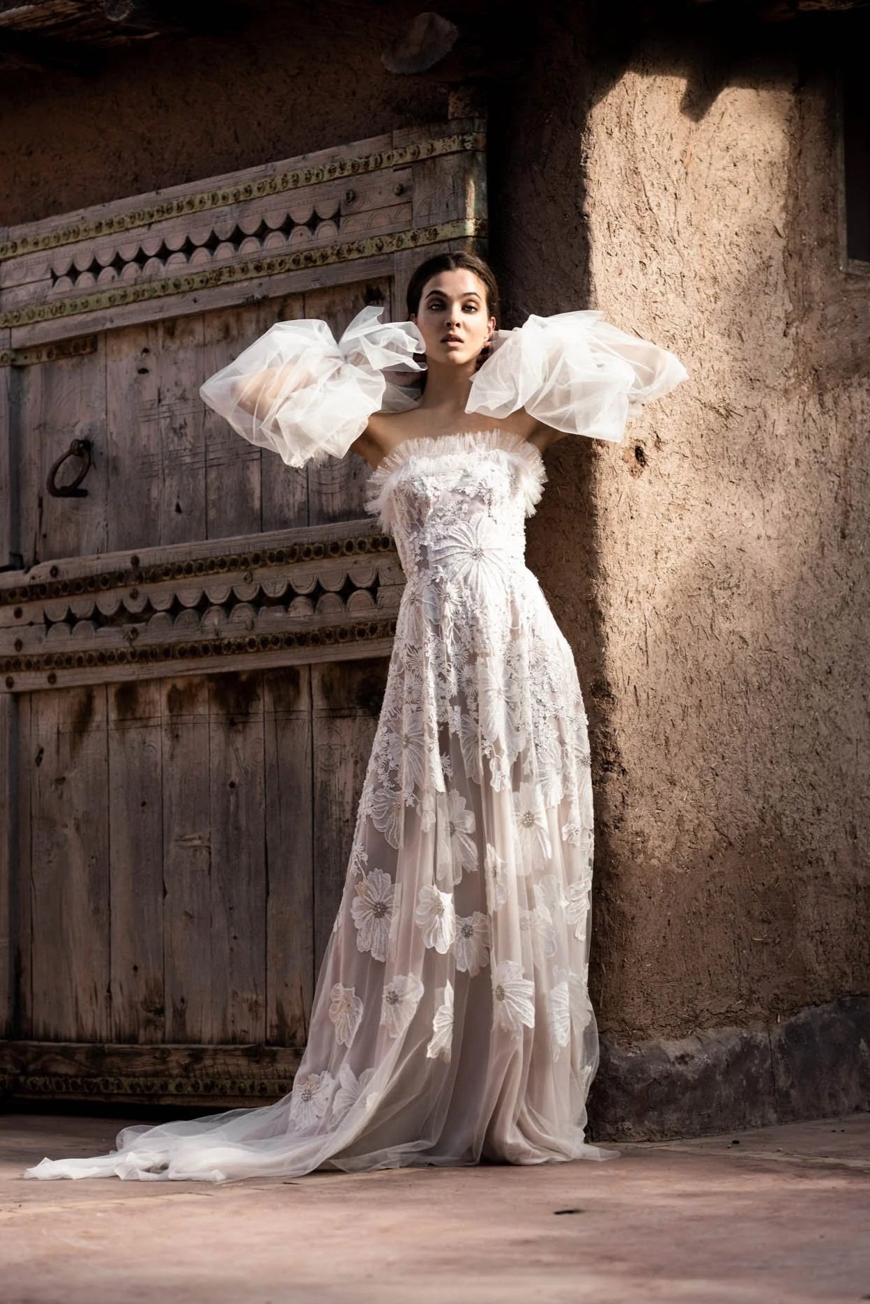 Bride wearing Richly embroidered silk and tulle wedding gown "Christine" from designer Edwin Oudshoorn