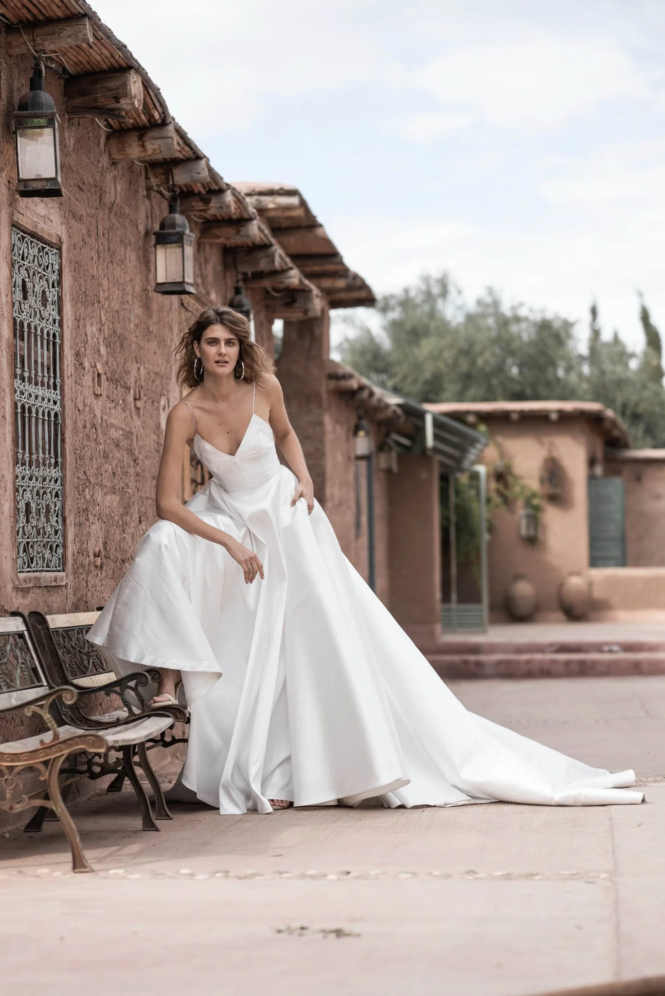 Bride wearing a white Mikado wedding dress with ballgown skirt and ballerina top "Meg" by Atelier Edwin Oudshoorn