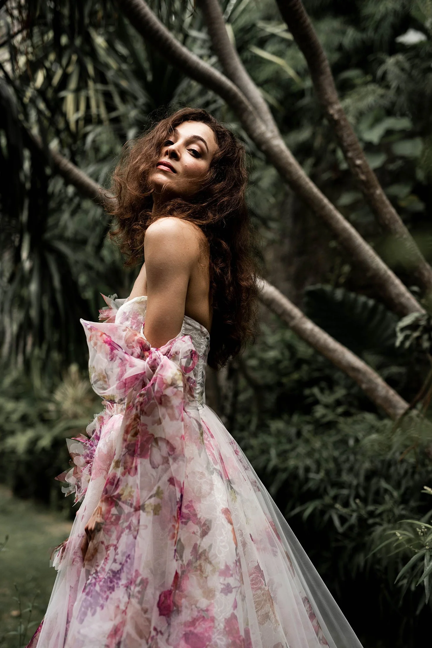 Woman with brown hair wears a pink floral wedding dress  "Rose" by Ateiier Edwin Oudshoorn