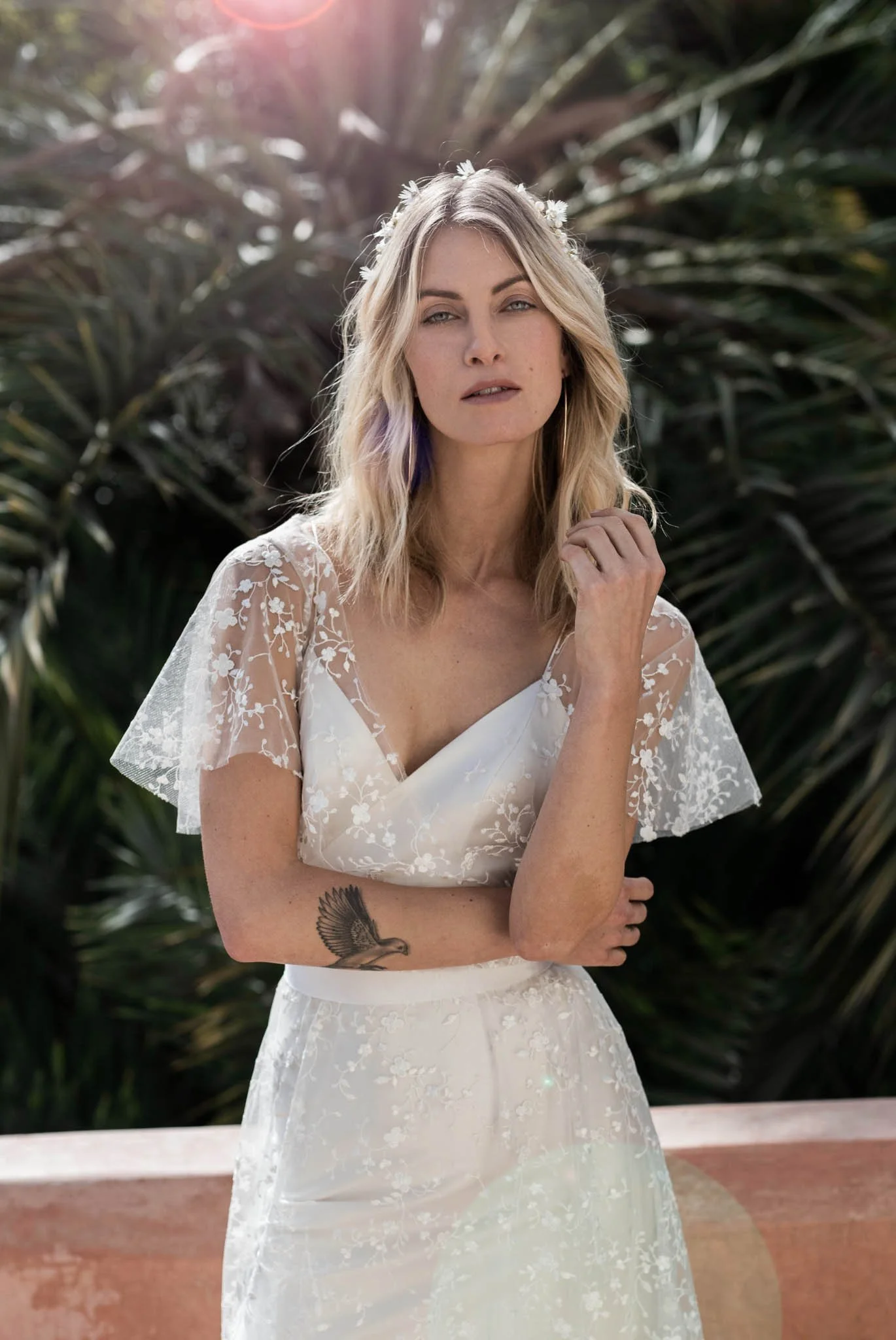 Model wearing the "Lily" tulle and crepe wedding dress from Atelier Edwin Oudshoorn