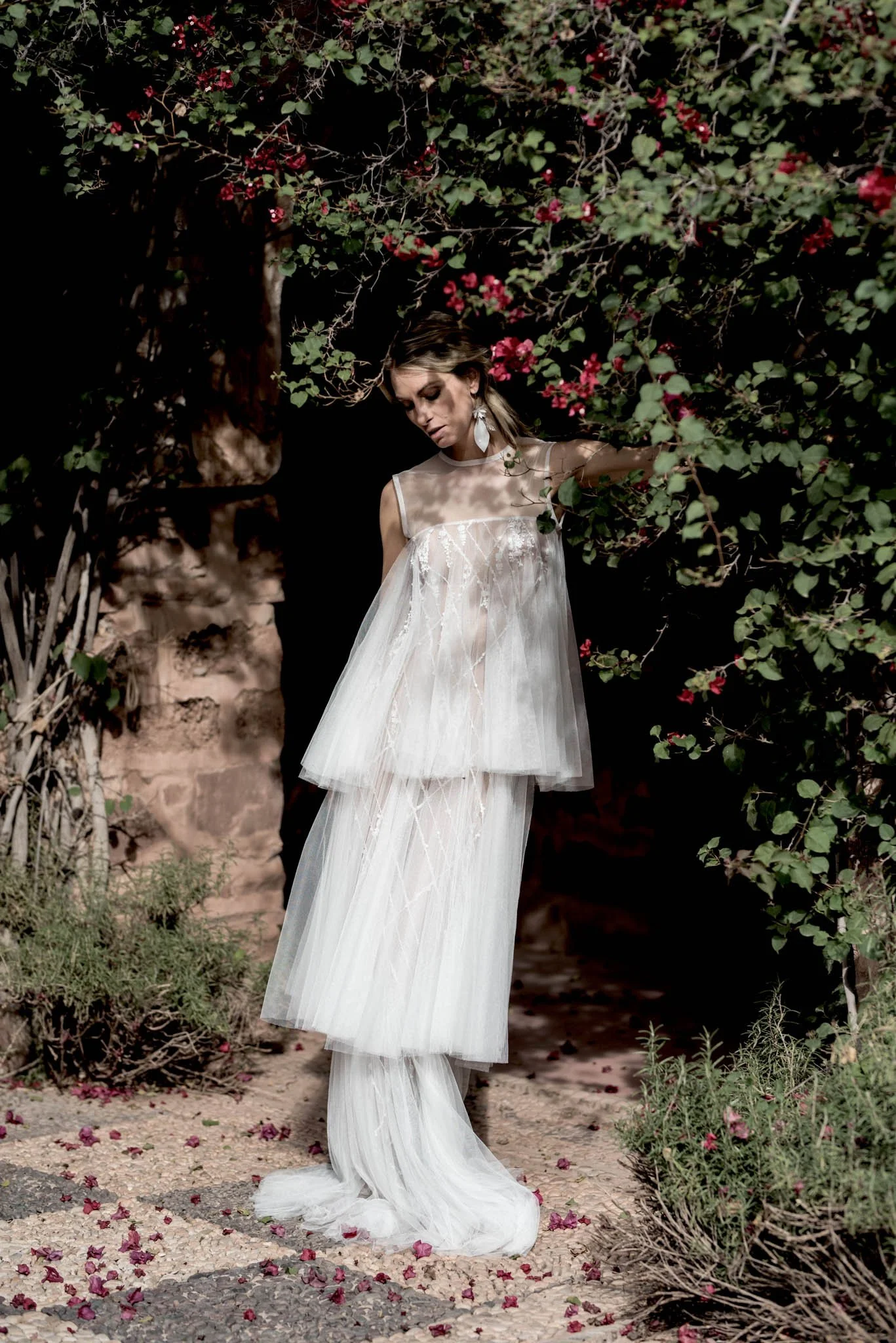 Bride wearing dramatic layered tulle wedding dress with beading and lace "Faye"  by Atelier Edwin Oudshoorn
