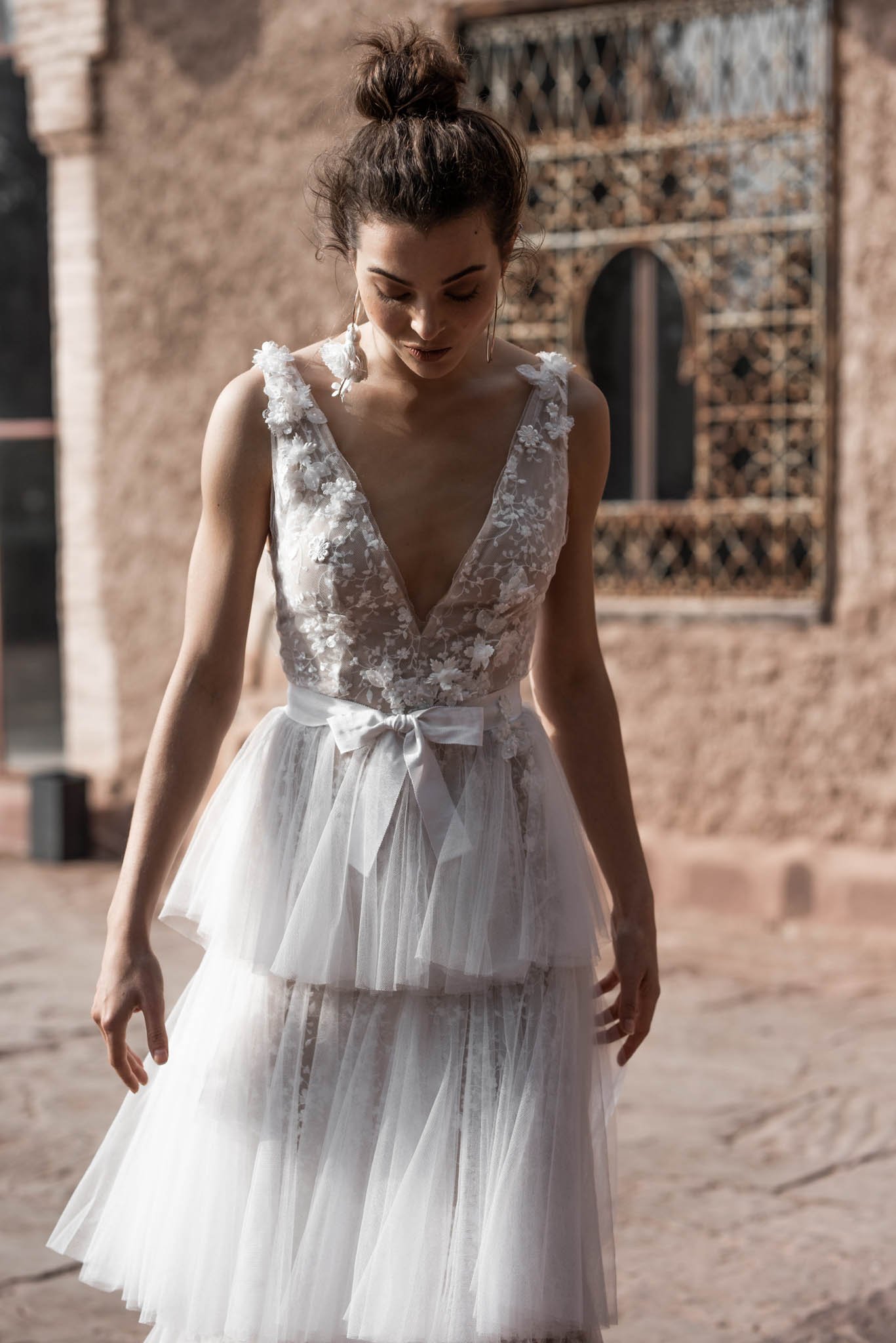 Bride wering a tulle and lace wedding gown from Designer Edwin Oudshoorn, with layered tulle skirt "Evie"