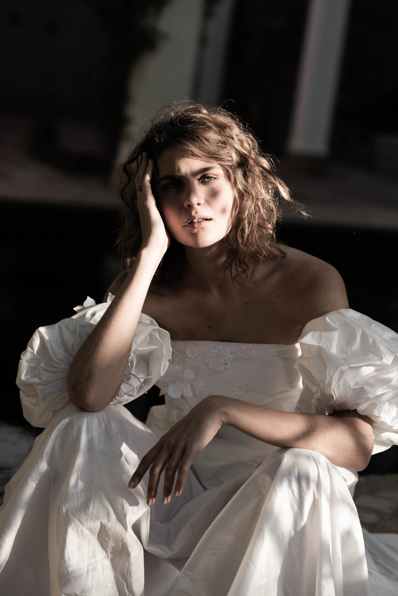 Bride wears a silk taffeta wedding gown with exaggerated bell form and puff sleeved "Scarlett" by Atelier Edwin Oudshoorn