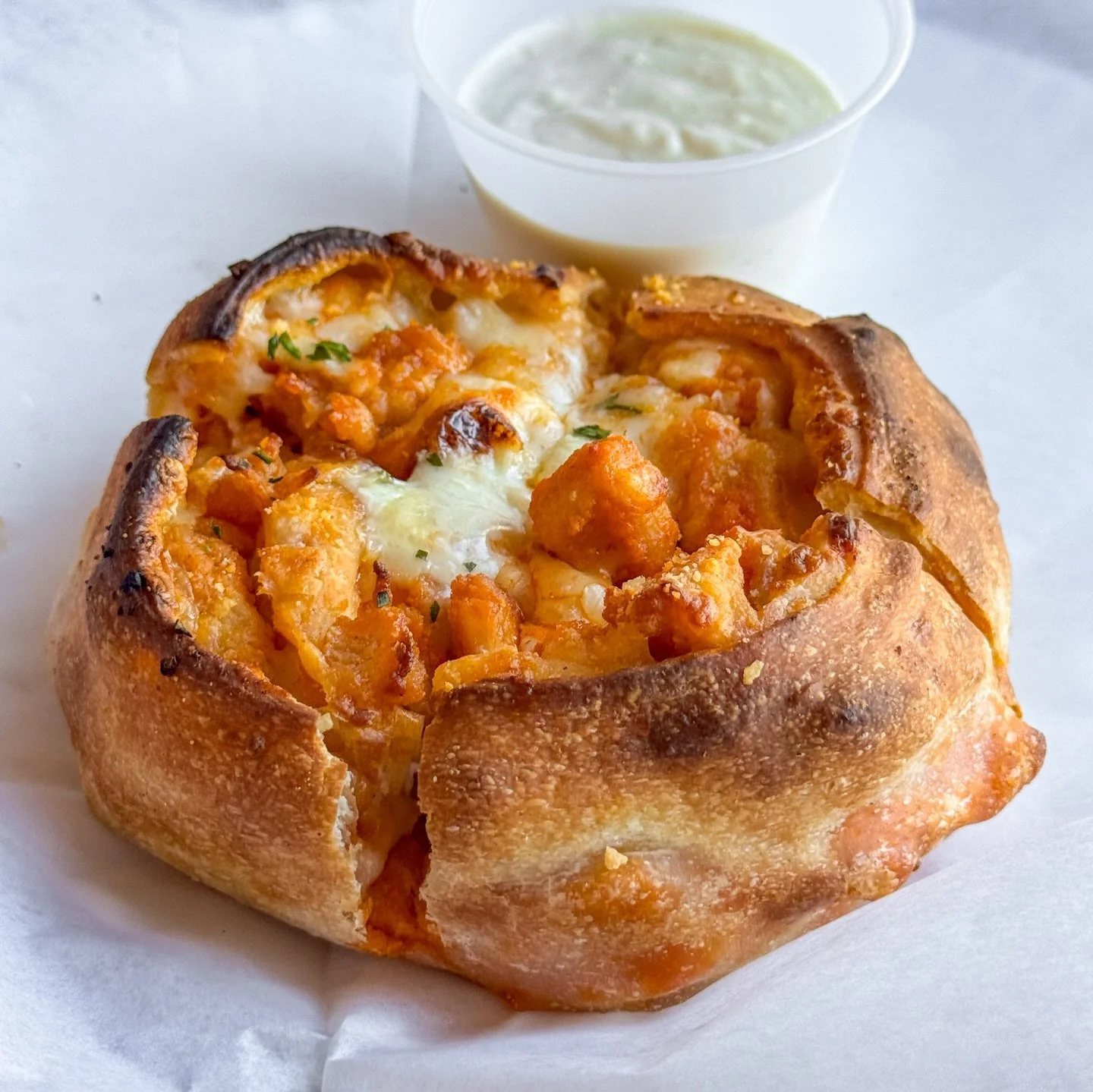 Buffalo chicken makes for a wheelie good pinwheel. 
📍: @pauliespizzeriali 
🌀🌀🌀🌀
I&rsquo;m a sucker for a pinwheel from a pizzeria, so when I saw this buffalo variant in the pizza case at Paulie&rsquo;s this past weekend, I knew I had to try it!
