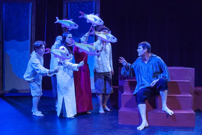 Garland Lyons with the ensemble of PASSION PLAY. Credit: David Kinder.