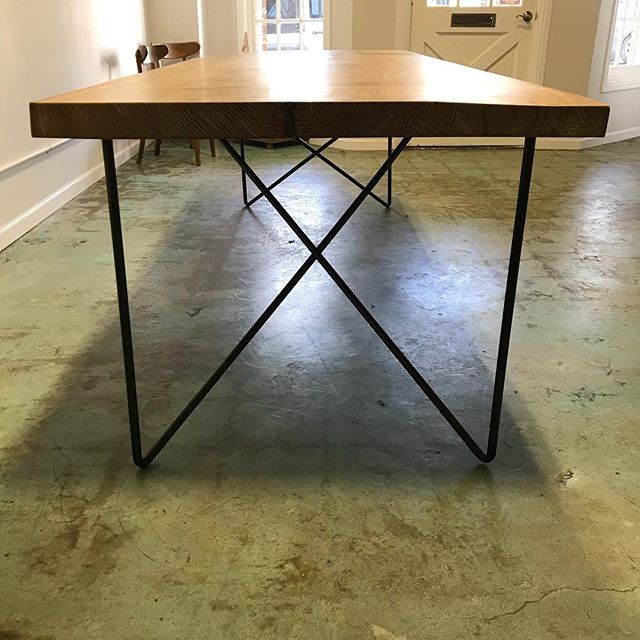 Table legs done in conjunction with @yhtimberworks for a new shop with @jenowendesigner and @catalystcreatives 
3/4&rdquo; solid round bar bent and crossed for stability and leg room. #livingiron #livingironsteelworks #customsteelwork #midcentury #mi